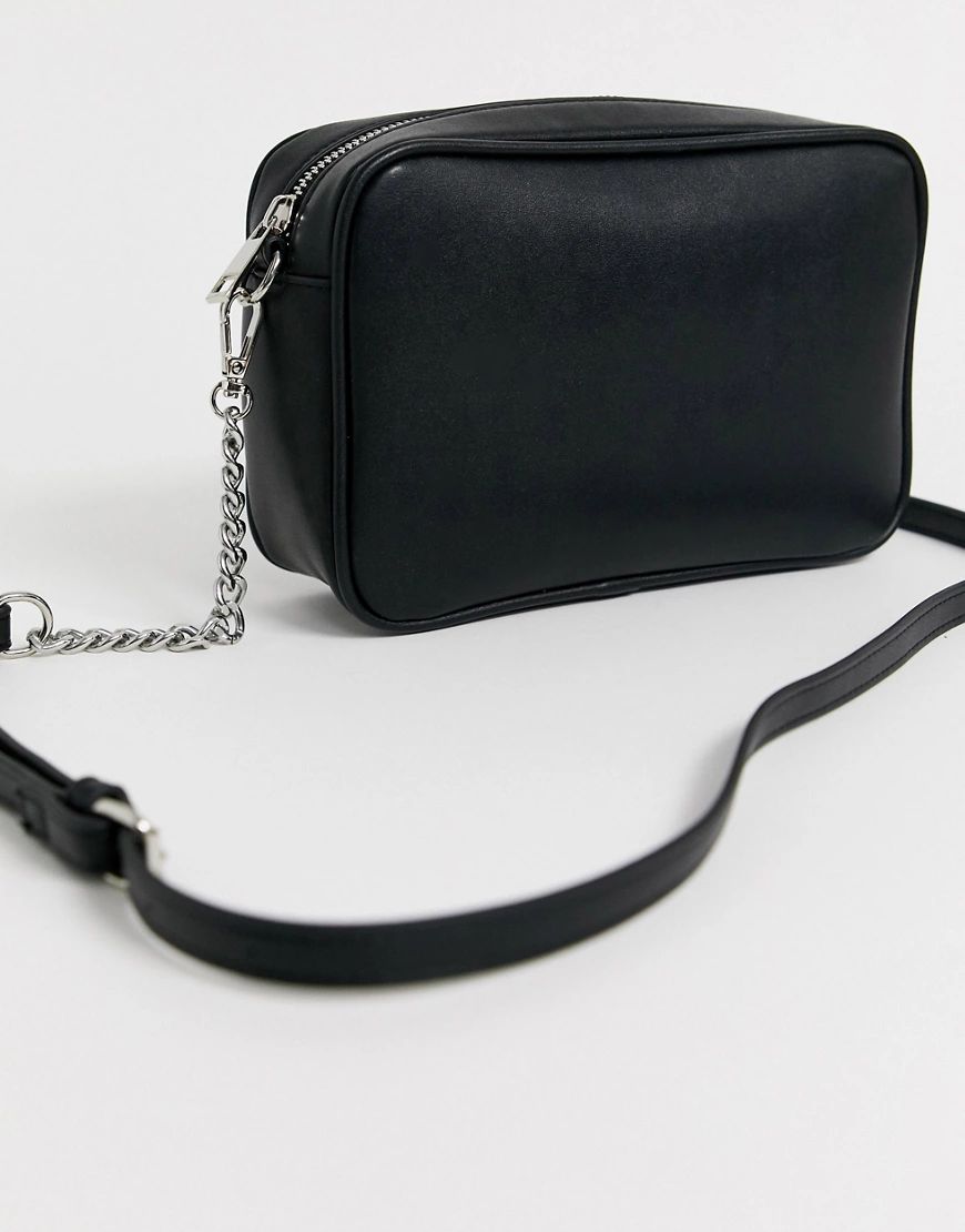 Truffle Collection black cross body bag with tassel | ASOS (Global)