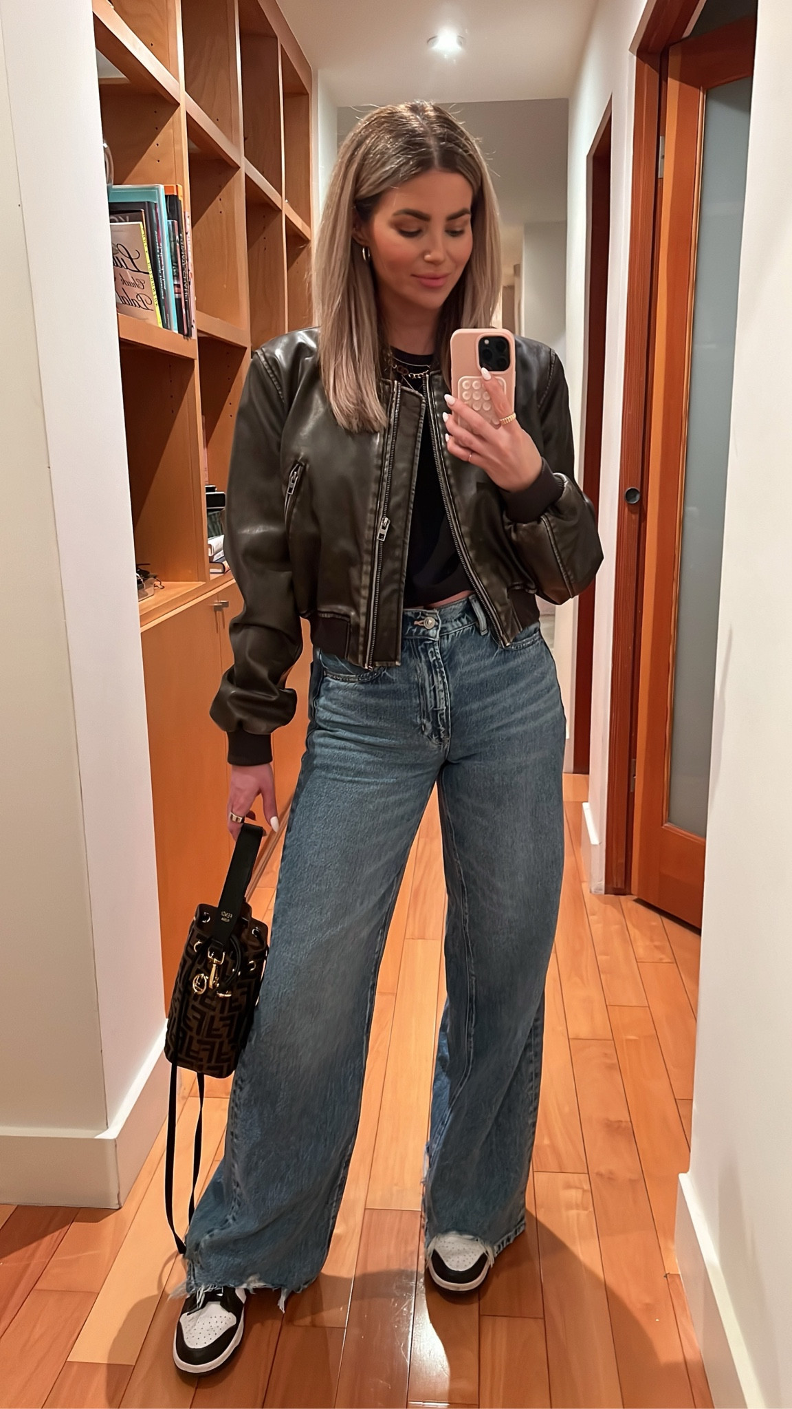 Wearing size 6 denim 
Small jacket 
Medium tee 
Shoes TTS 