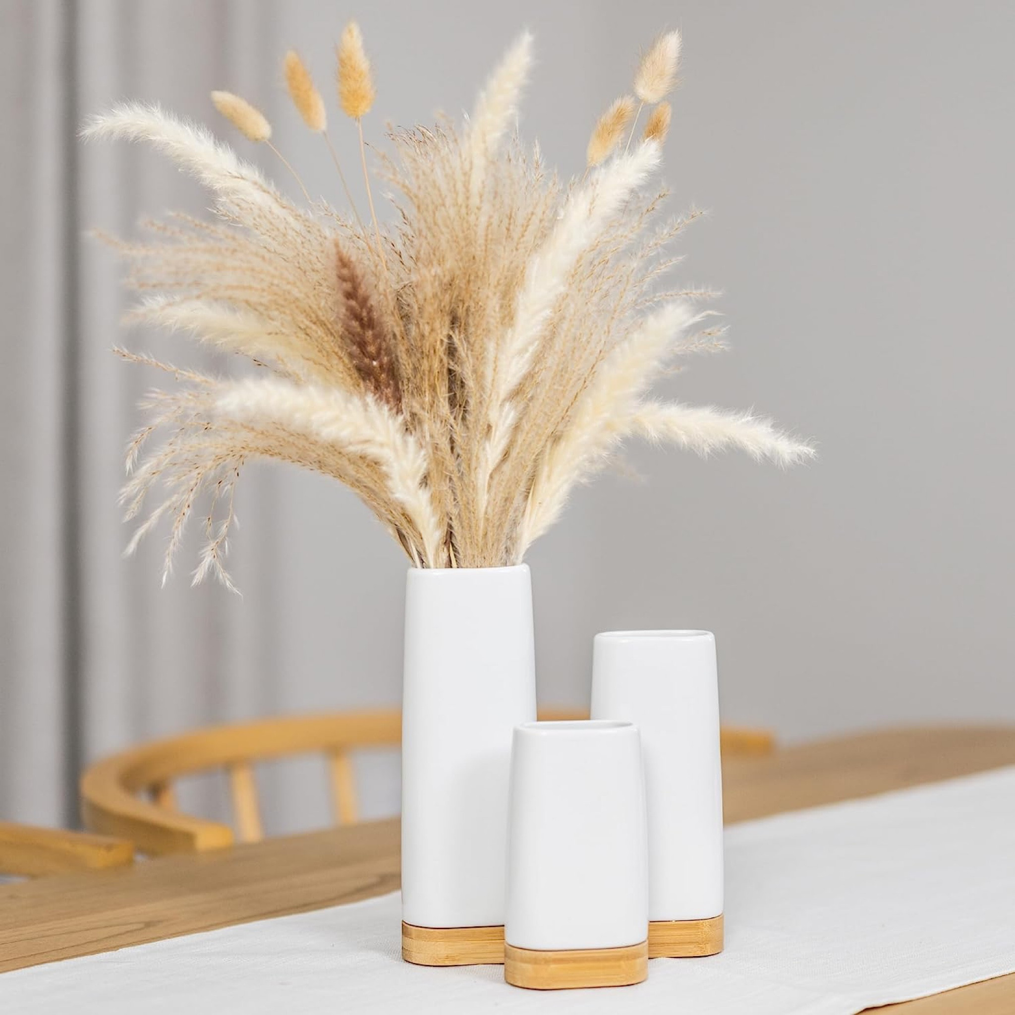 Vase set of three! Unique minimalist vases with bamboo base. Modern ceramic vases for aesthetic shelves, Home decor, and Kitchen accessories

#LTKunder50 #LTKhome #LTKunder100