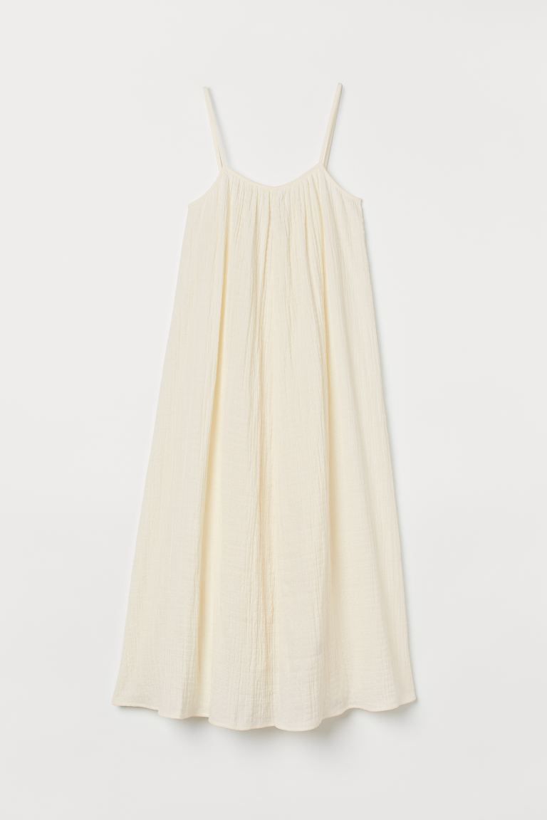 Voluminous, ankle-length dress in woven cotton fabric. Narrow shoulder straps and gathers at top.... | H&M (US + CA)