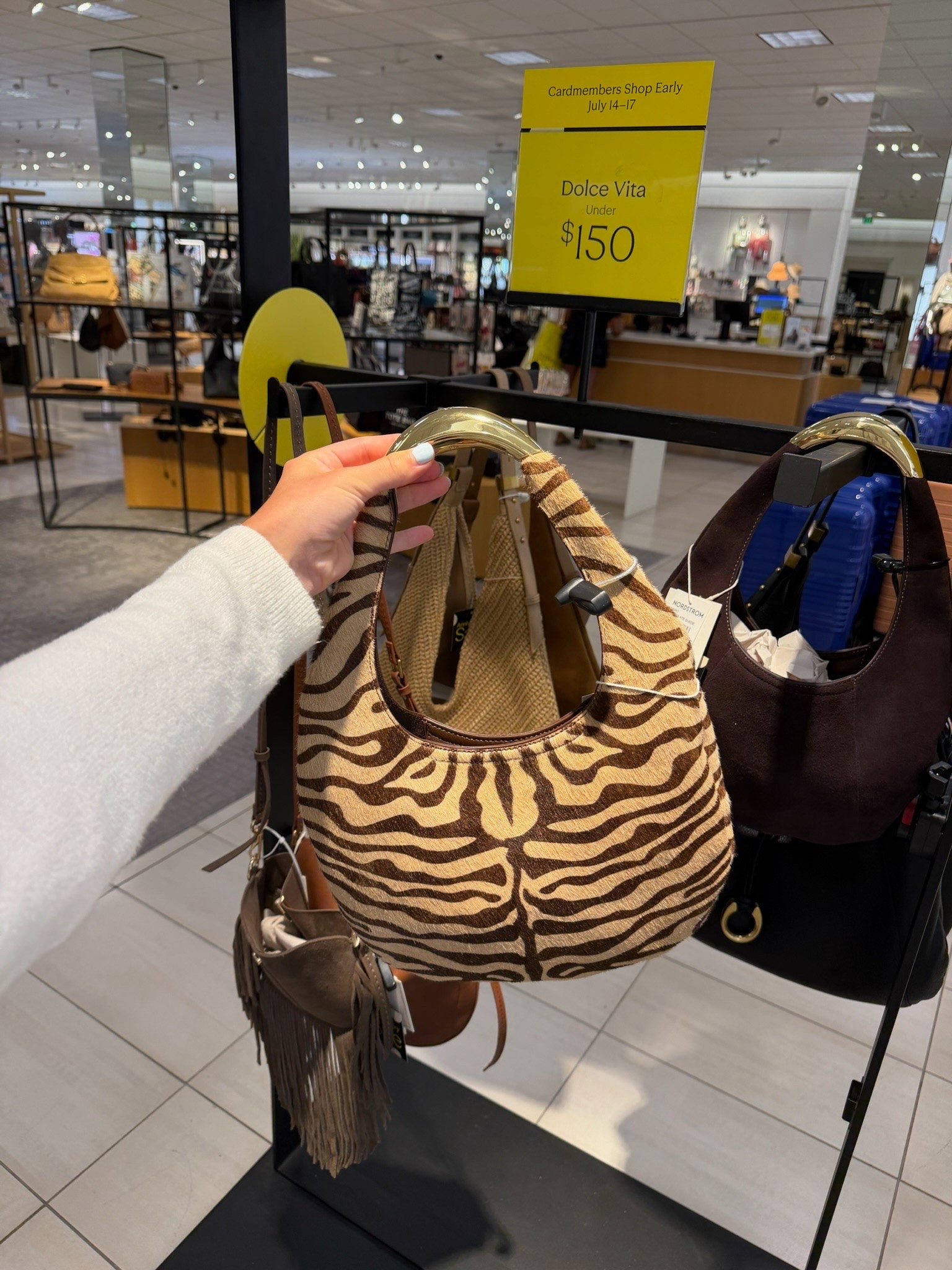 If you’re looking to add a fun accessory to your wardrobe, this zebra print shoulder bag is such a good pick. The shape feels modern while the print adds just enough personality to any neutral outfit. It’s one of my favorite statement bags from the Nordstrom Anniversary Sale.

#LTKootd #LTKmomlife #LTKgrwm