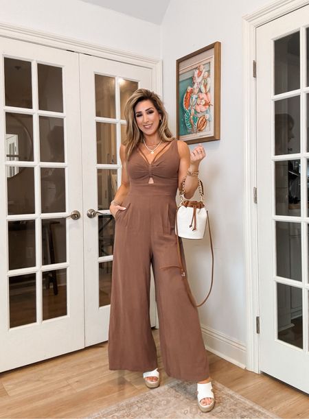 Summer jumpsuit, summer outfit, wide leg jumpsuit with pockets, cutout detail and adjustable straps, sandals, vacation outfit, Gigi New York bucket bag

#LTKItBag #LTKStyleTip #LTKOver40