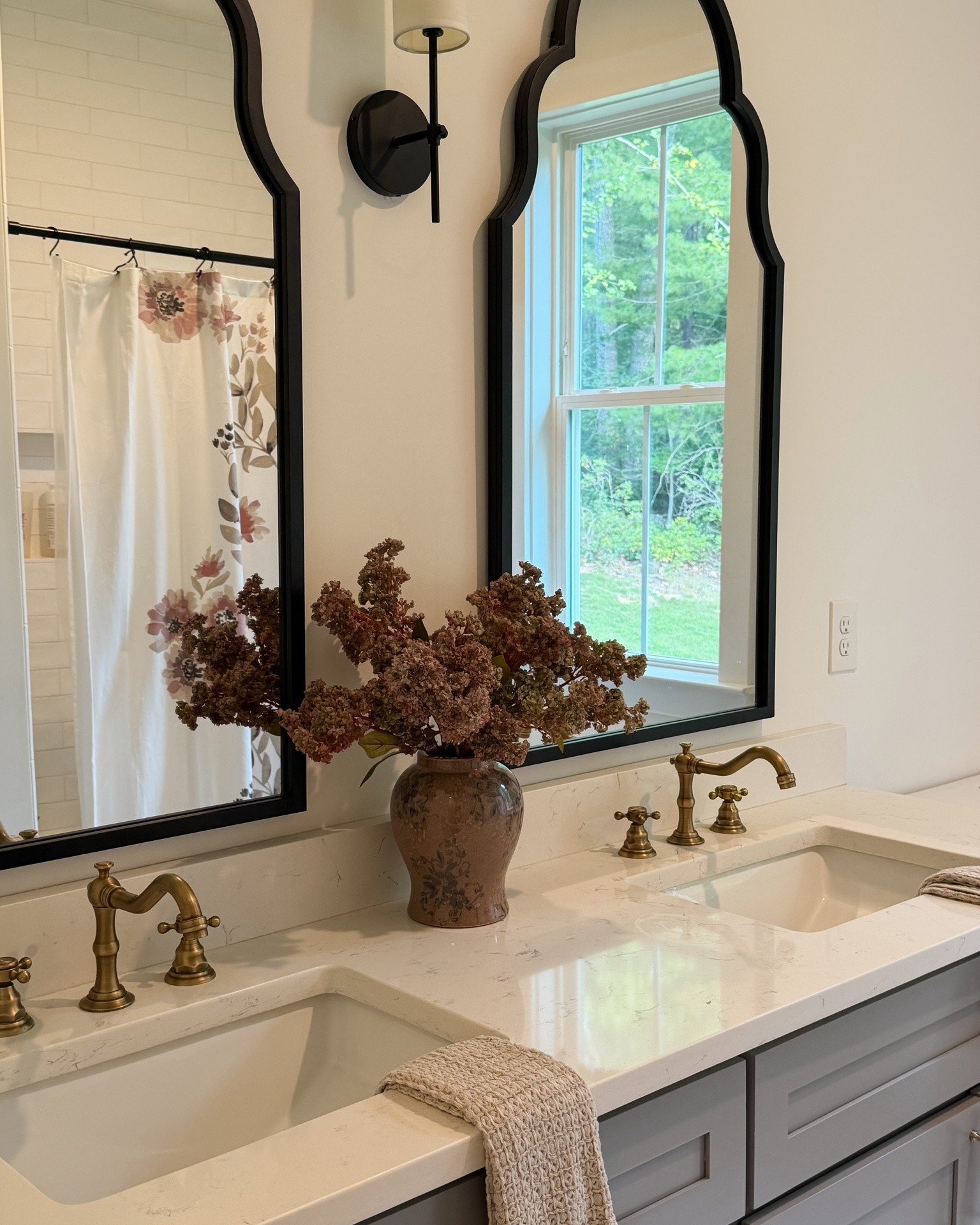 I got these gorgeous hydrangea stems for fall and they’re the perfect touch to our girls bathroom. They’re a combination and pink and green and they’re currently 40% off. 

I used five stems for this vase. They do shed some while I was styling but once I was done, it has been fine.

#LTKHome #LTKSaleAlert