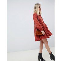 ASOS DESIGN tiered trapeze mini dress in broderie - Rust | ASOS ROW