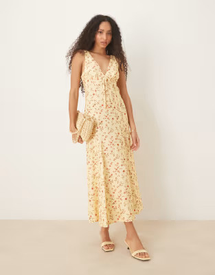 ASOS DESIGN button front sleeveless maxi dress in yellow ditsy print | ASOS (Global)