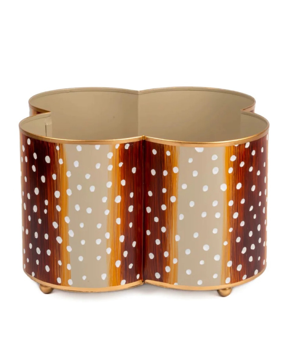 If you’ve seen my family room rug, you know I love antelope. This quatrefoil cachepot is a great option for florals or greens. I’d try an orchid or fern (real or faux!) but I’d also love some potted bulbs, a topiary or even a Christmas tree (next December that is!). A little splurgy but it’s on sale! 
Adding a few faux choices to put inside...

#LTKhome #LTKsalealert #LTKstyletip