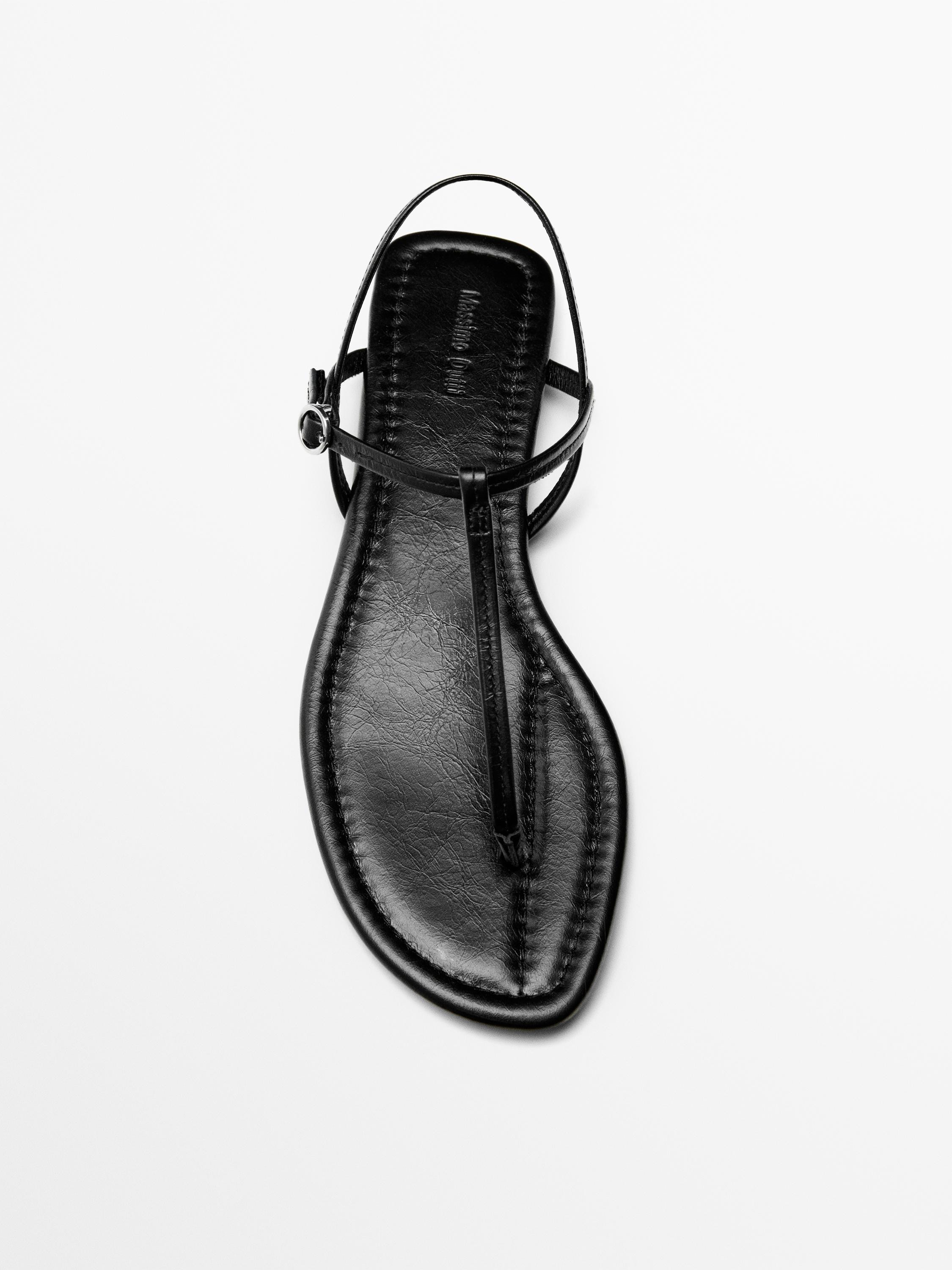 Strappy flat sandals with toe divider | Zara US