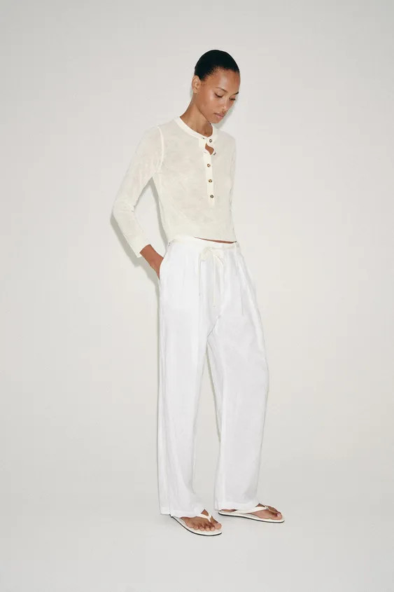 Round neck long sleeve jumper. Front buttons. | Zara US