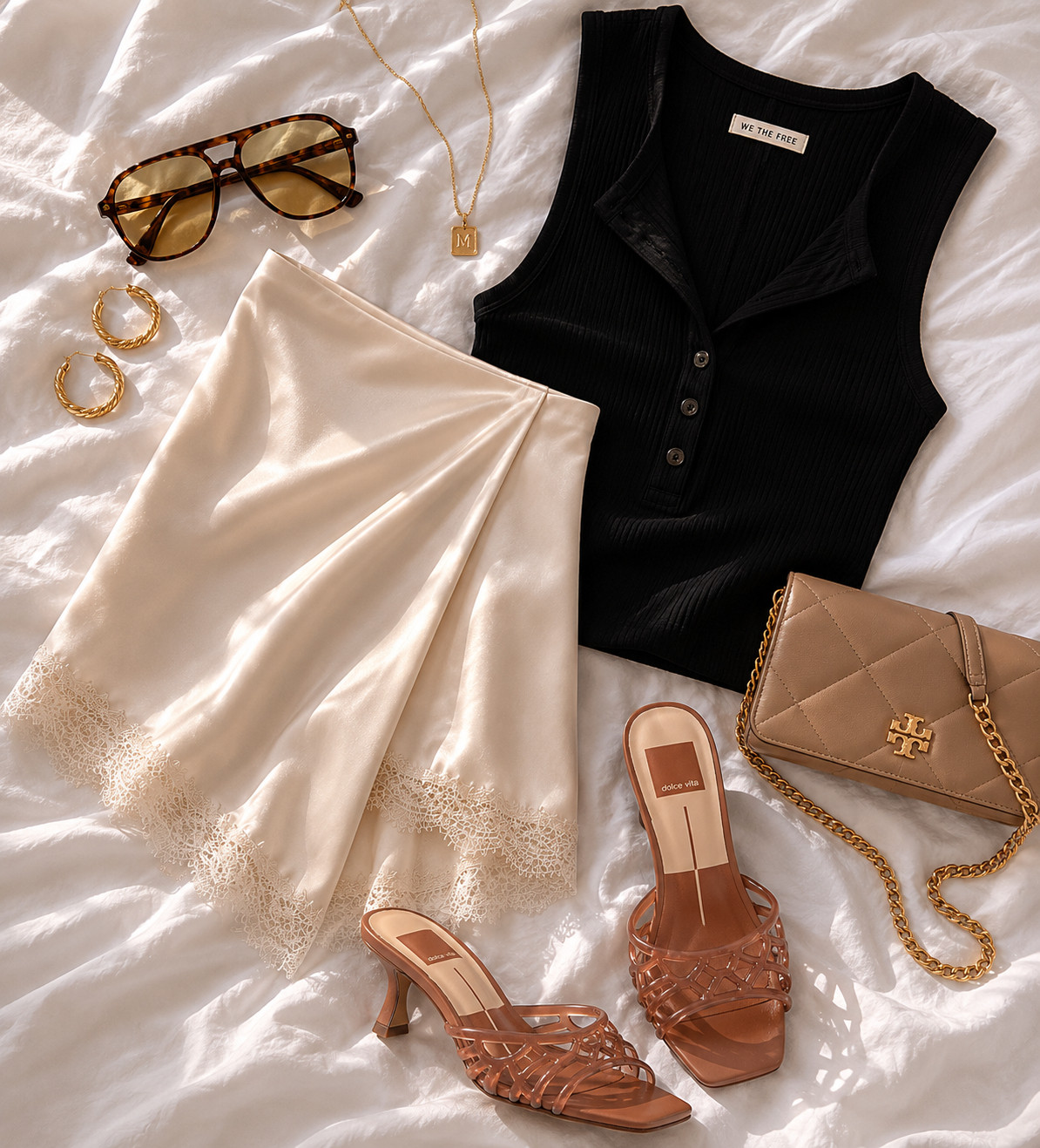 Silk lace trim skirt, ribbed knit vest, dolce vita jelly heels, tory burch bag

date night outfit 

 #LTKSeasonal #LTKSaleAlert