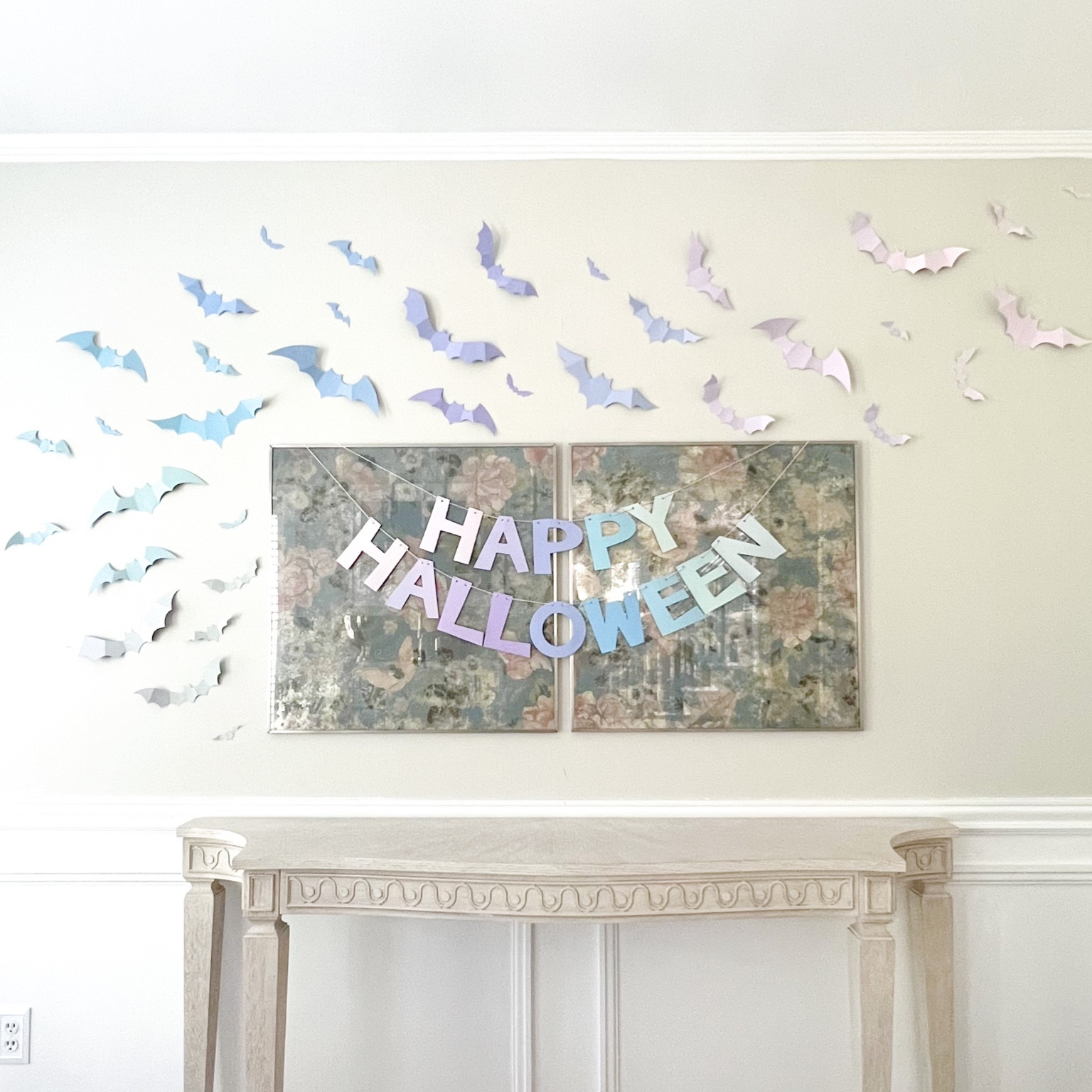 Pastel Halloween Bats & Banner. I used acrylic pastel paint to do an easy diy project to transform a happy Halloween banner & bats into a pastel & ombré centerpiece. 

#LTKunder50 #LTKHalloween #LTKSeasonal