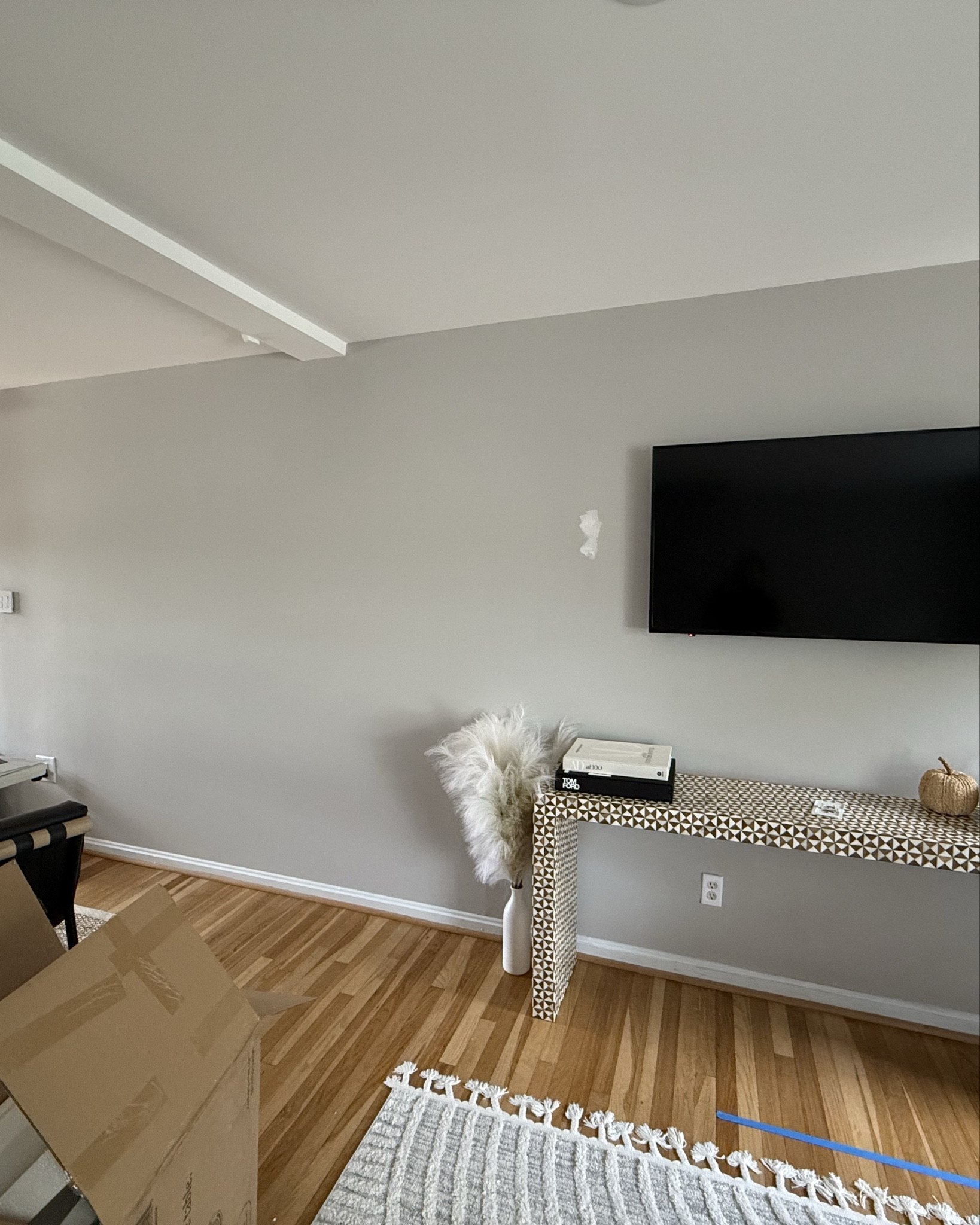 living room wainscoting before & after 

#LTKHome