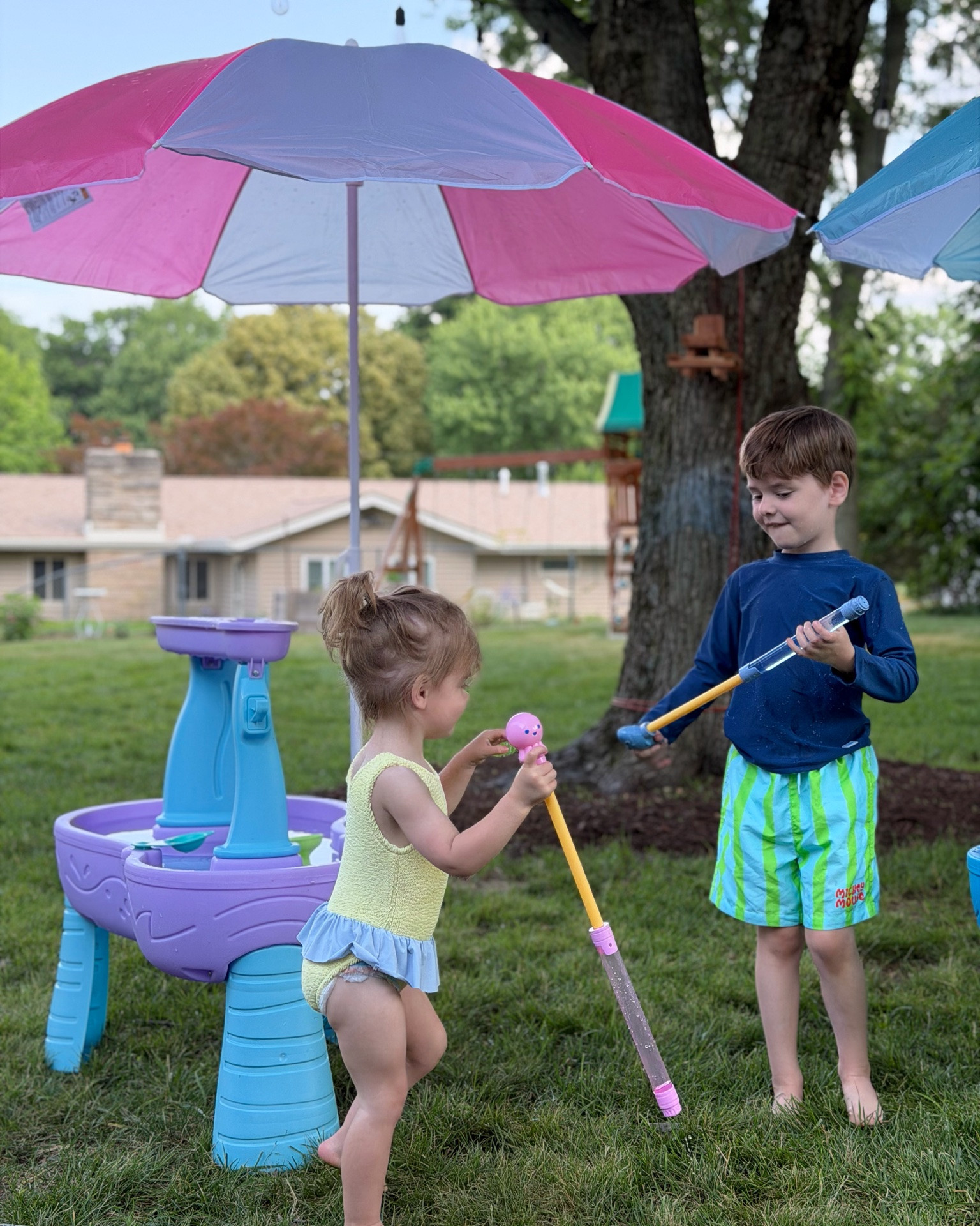 Water table morning for the win🙌🏼 keeps them so busy and happy! Found the umbrellas at five below ($7) and they are perfect for a little extra shade once the suns fully over us!! ☀️

#LTKdayinmylife #LTKmomlife #LTKKids