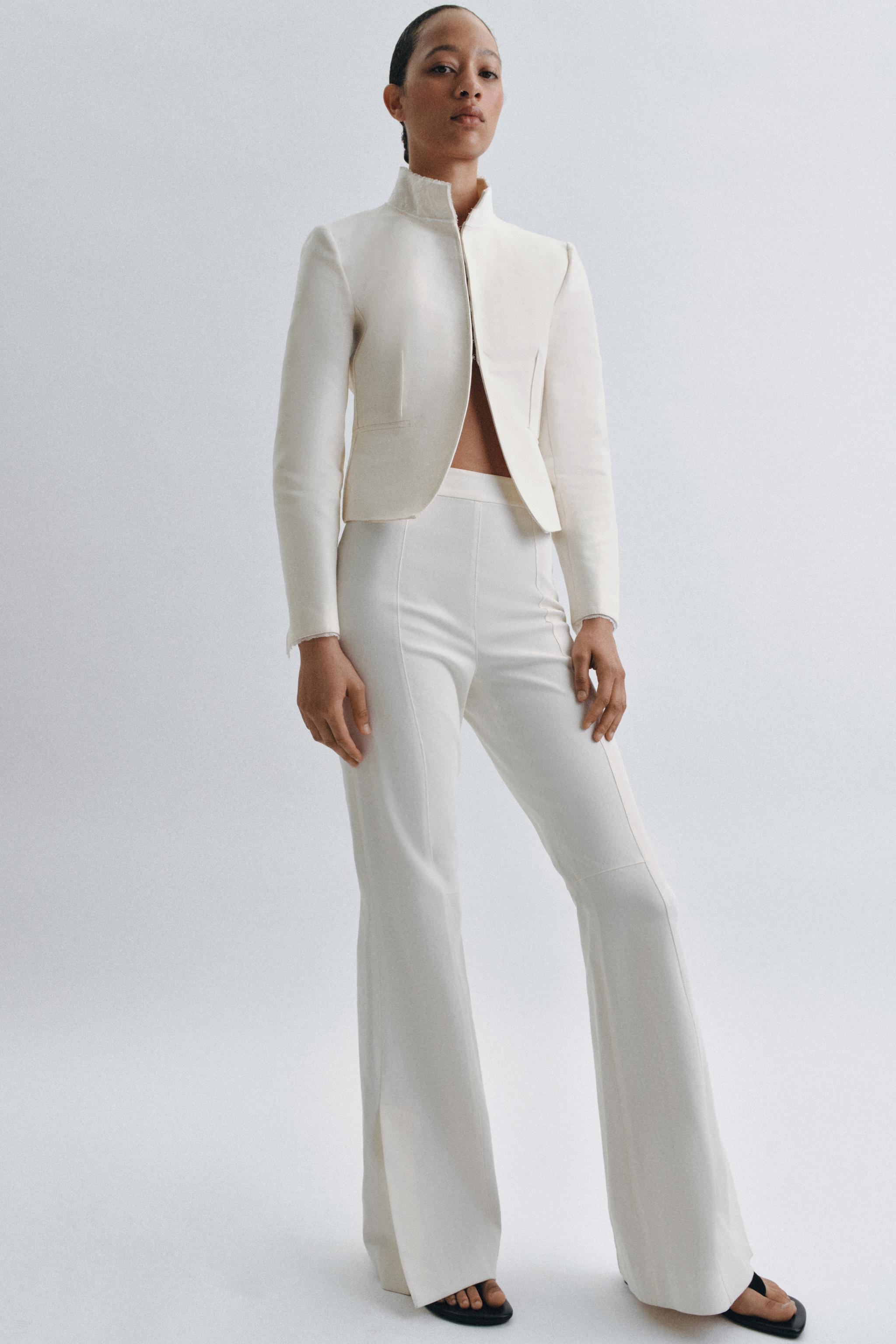 ZW COLLECTION FLARED TROUSERS WITH VENTS | Zara UK