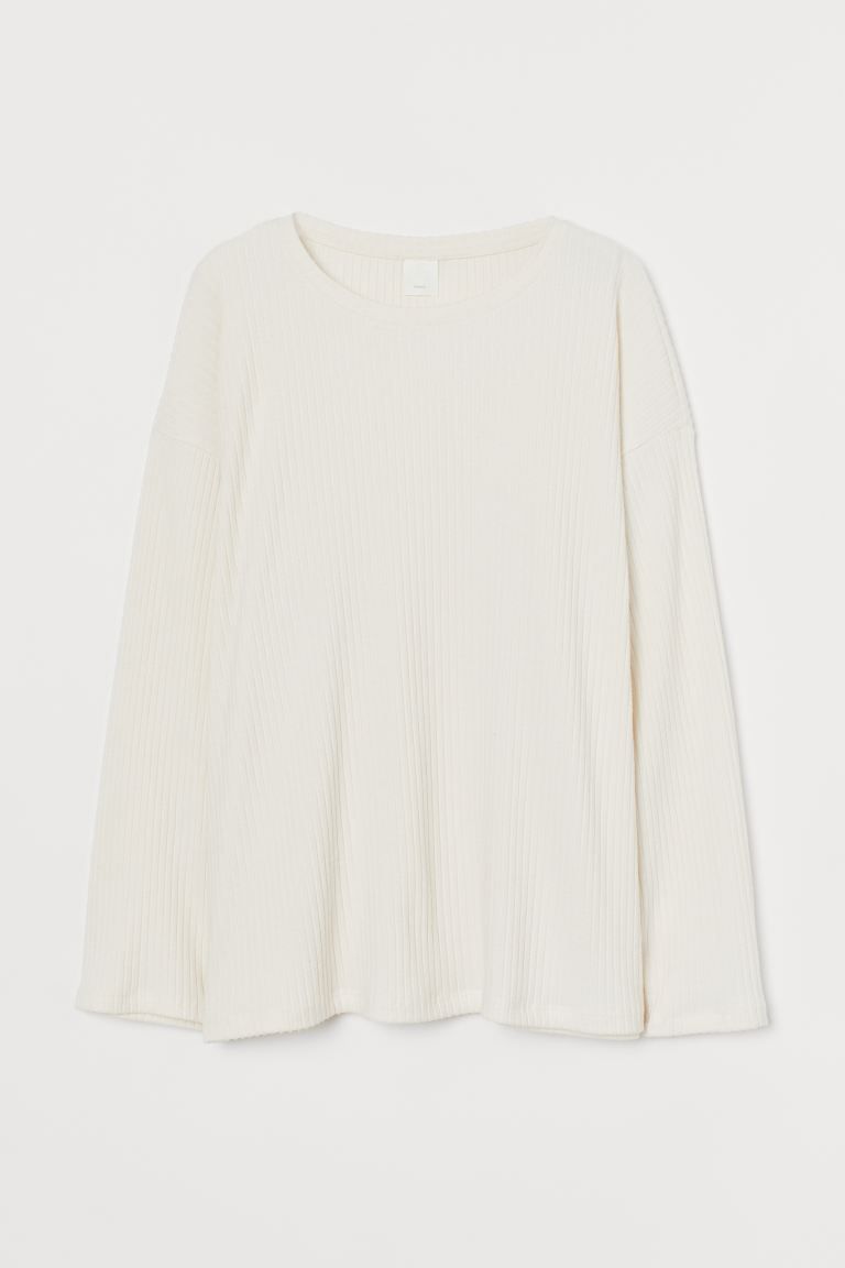 Top in soft, rib-knit fabric. Round neckline, dropped shoulders, and long sleeves. | H&M (US + CA)