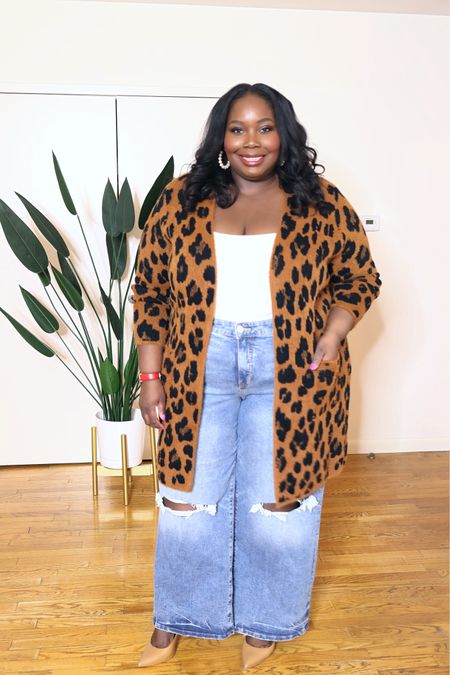 Leopard print is trending and I found this super cute cardigan to create a stylish winter plus size outfit 

#LTKplussize #LTKfindsunder50 #LTKmidsize