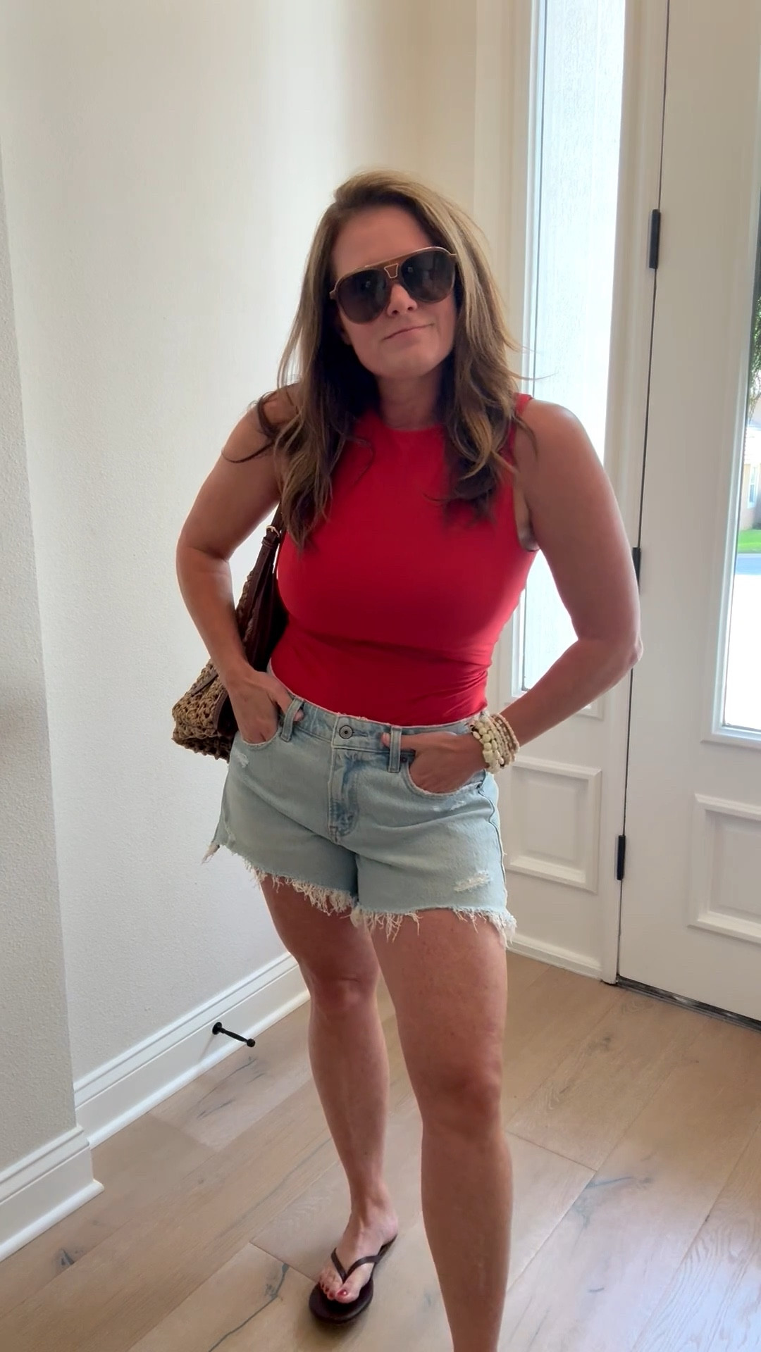Loving this look. Easy and yet still feels intentional. 

This bodysuit has a built-in bra 🙌

I love these denim shorts from Abercrombie! Not too short, and comes in different washes and styles. I personally always grab the curve love for a comfy fit!

And this bag is 😮‍💨 A NEED! 

#LTKootd #LTKOver40 #LTKgrwm