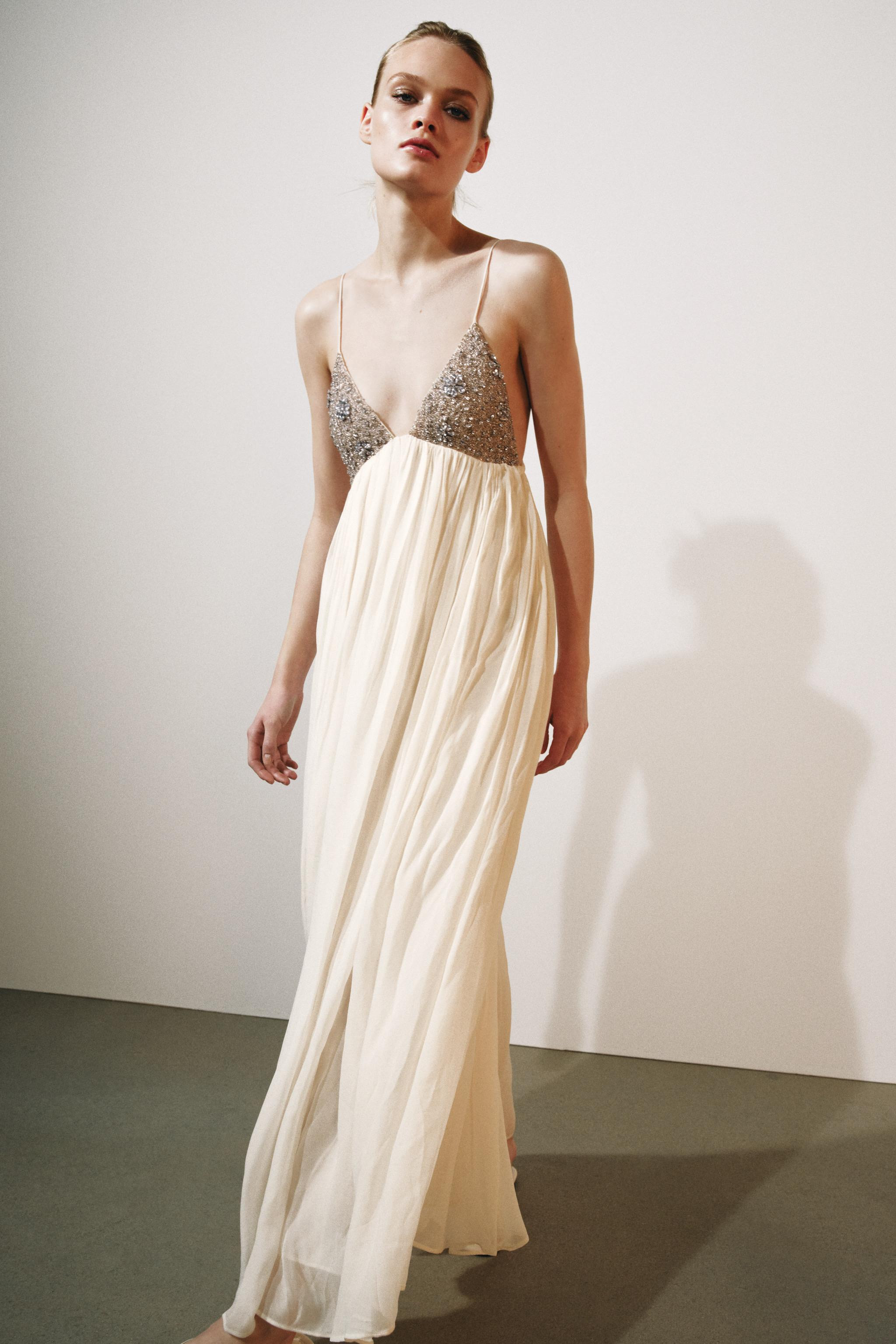 DescriptionCompositionMeasurementsModel height: 176 cmZARA WOMAN COLLECTIONDress with main fabric... | Zara UK