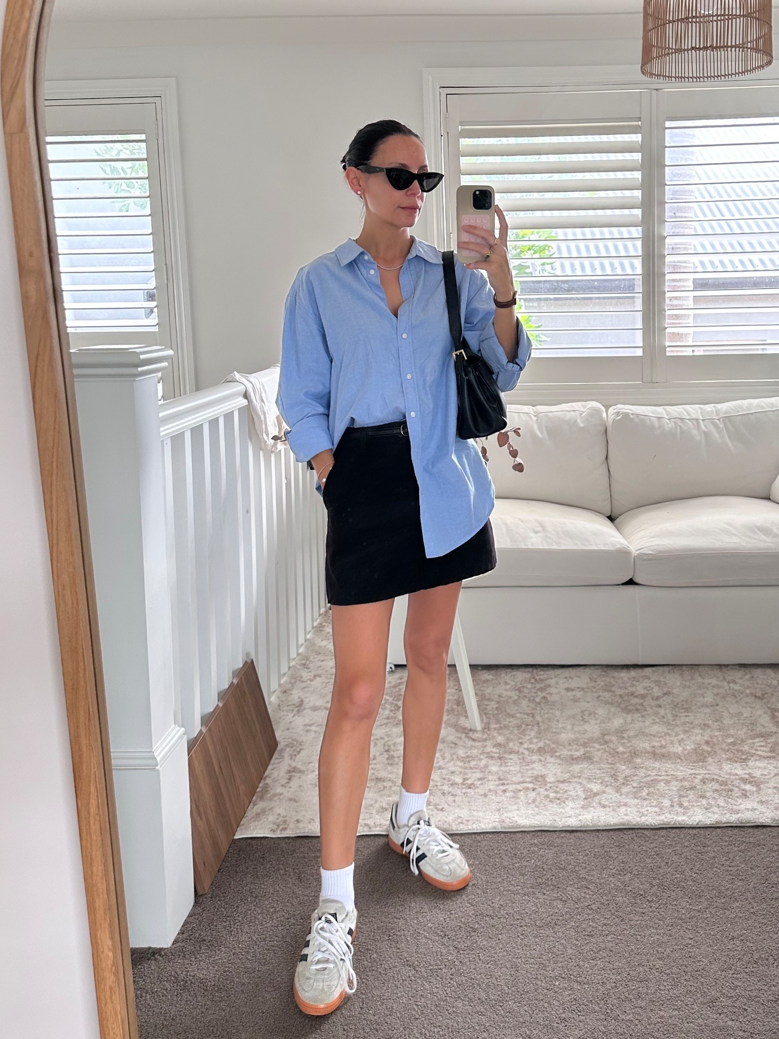 Simple skirt and blue shirt outfit 

#LTKspring #LTKaustralia