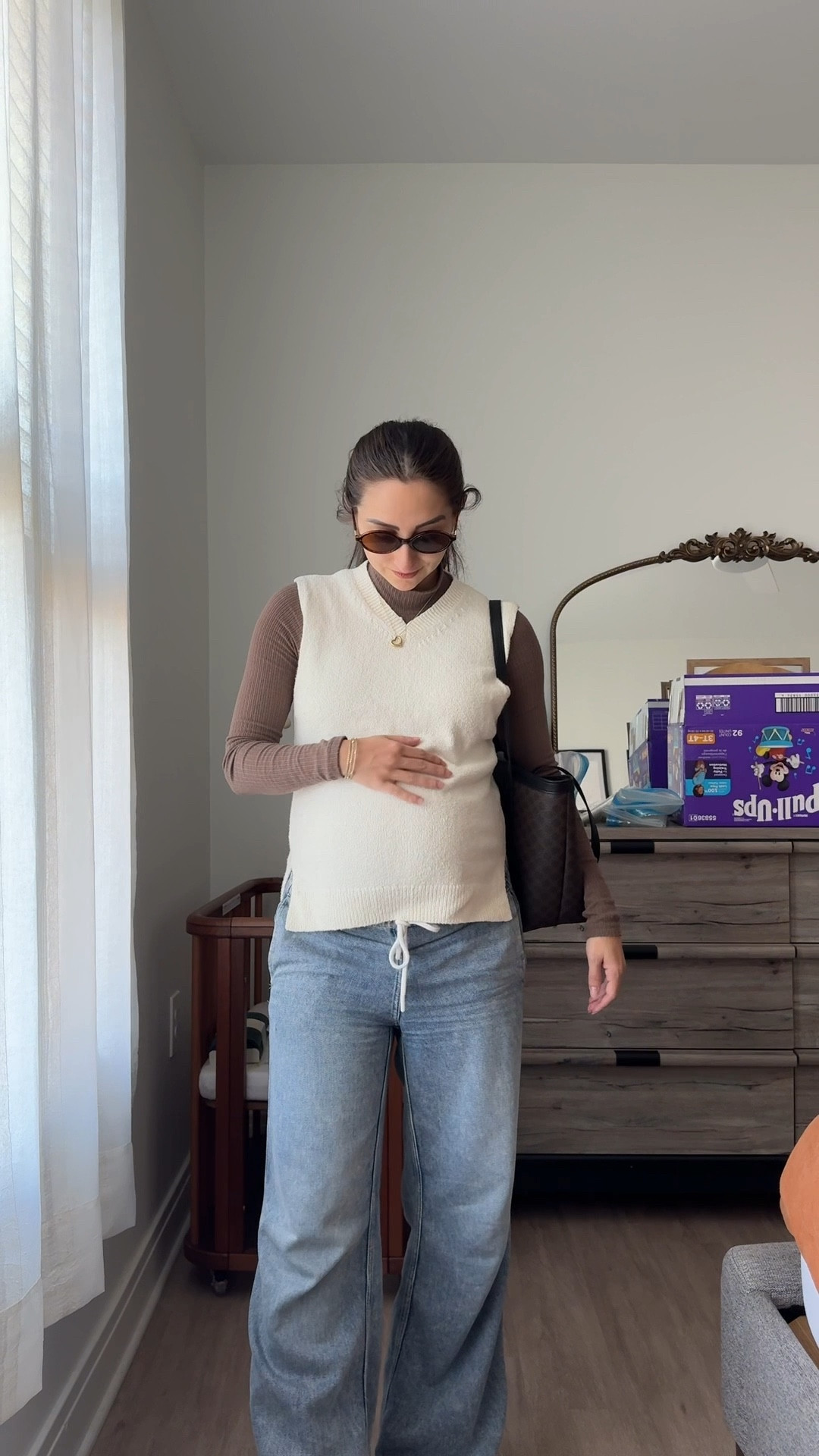 bump-friendly maternity fall fashion // white sweater vest // brown mock neck layering top // pull-on jeans 

#LTKStyleTip #LTKBump #LTKPetite