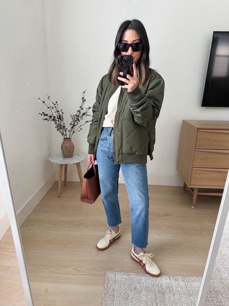 Zella quilted jacket. Wearing the xs. Thin with side slits. 

Zella jacket xs
Everlane sweater xs
Levi’s jeans 25. Cut hems
Onitsuka sneakers 4 men’s. 
Everlane bag 
Celine sunglasses  

Spring outfits, spring style, sneakers, jeans, purse 

#LTKshoecrush #LTKitbag #LTKfindsunder100