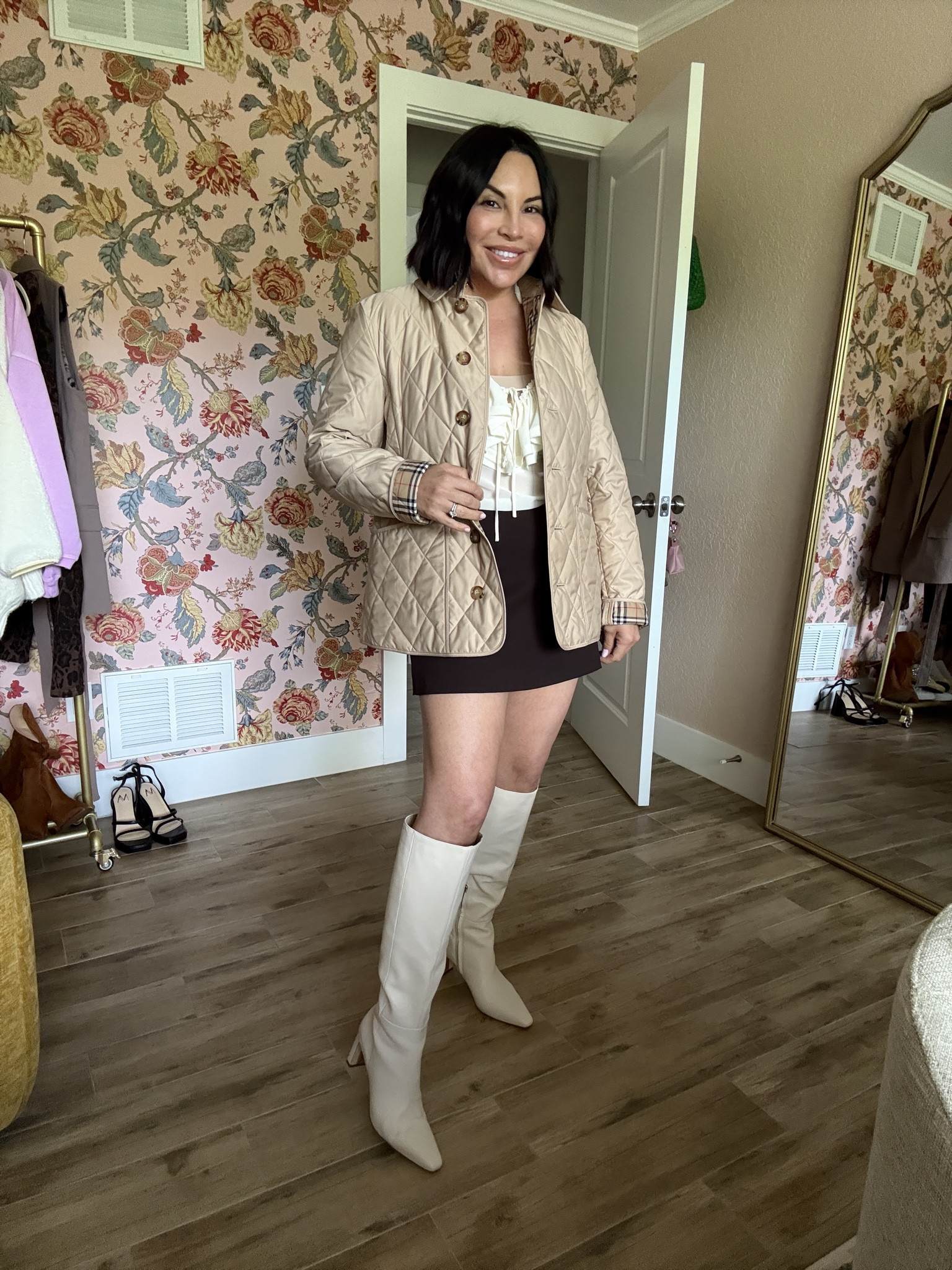 I styled my new Burberry quilted coat with this brown mini skort and knee-high boots.  #kneehighboots #thanksgiving #quiltedcoat

#LTKootd #LTKSeasonal #LTKOver40