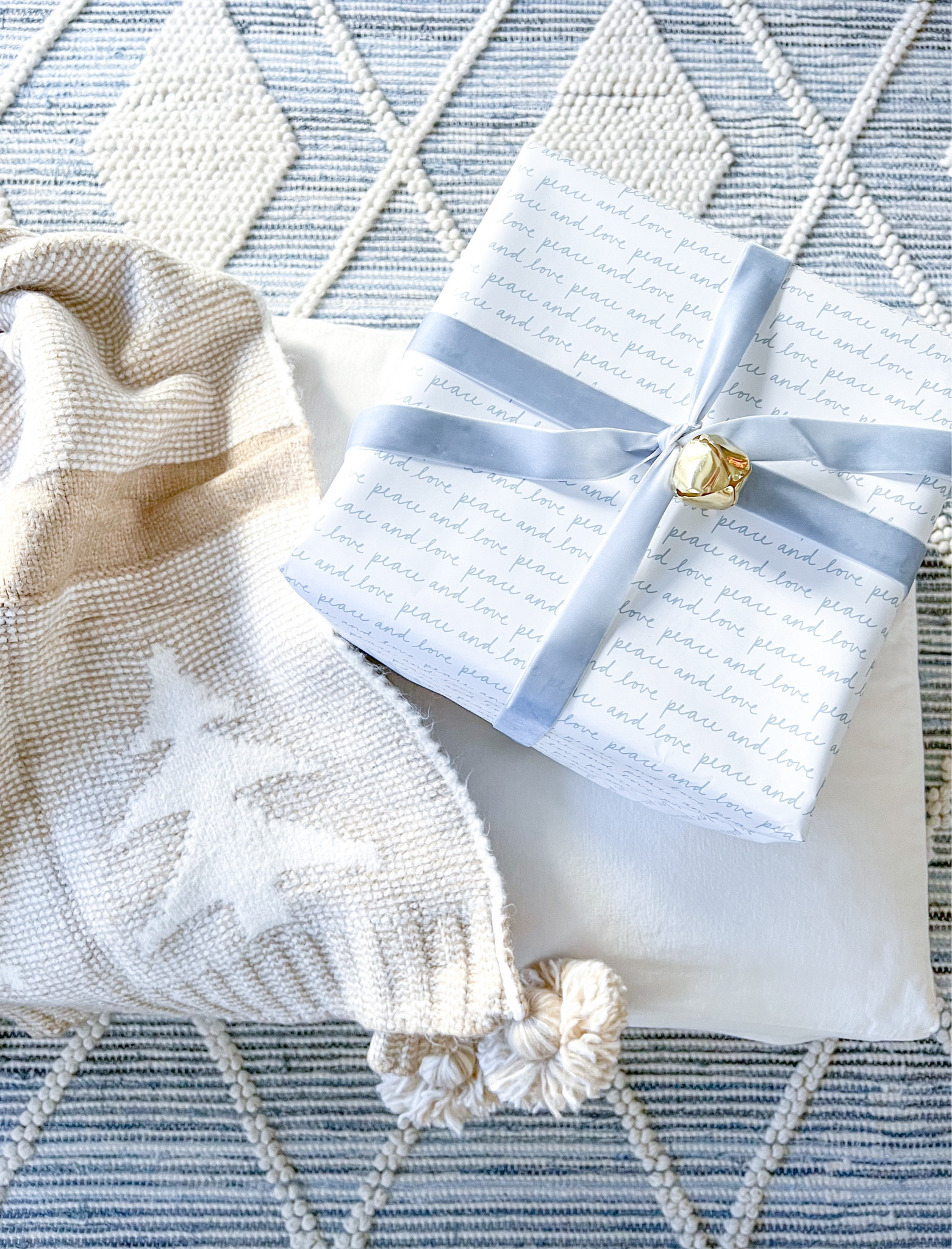 If you want a cozy throw blanket that you can use during the holidays and keep out all winter long, this one is a WINNER! I was pleasantly surprised about how plush it is, and of course the neutral colors in it are perfect! It would make a great inexpensive gift for a neighbor, teacher, friend or family member - just $35!
-
Target christmas decor, target holiday decor, coastal christmas decor, blue and white christmas decor, gifts for her, gifts for women, gifts for hostess, Target Studio McGee, neutral christmas decor, winter decor, blue and white rugs, coastal home decor, living room rugs, 8x10 rugs, 9x12 rugs, 10x14 rugs, textured rugs, serena & lily rugs, coastal rugs, beach house rugs, beach house decor, throw blankets, cozy gifts, target wrapping paper, christmas wrapping ideas, gift ideas, Christmas throw blanket, gifts under $50

#LTKHoliday #LTKhome #LTKfindsunder50