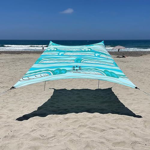 Neso Gigante Portable Beach Tent Sun Shelter - Lightweight Beach Shade Canopy - Easy Setup for Family Outings - Patented Reinforced Corners - UPF 50+ Sun Protection - 8ft Tall, 11 x 11ft - Swells | Amazon (US)