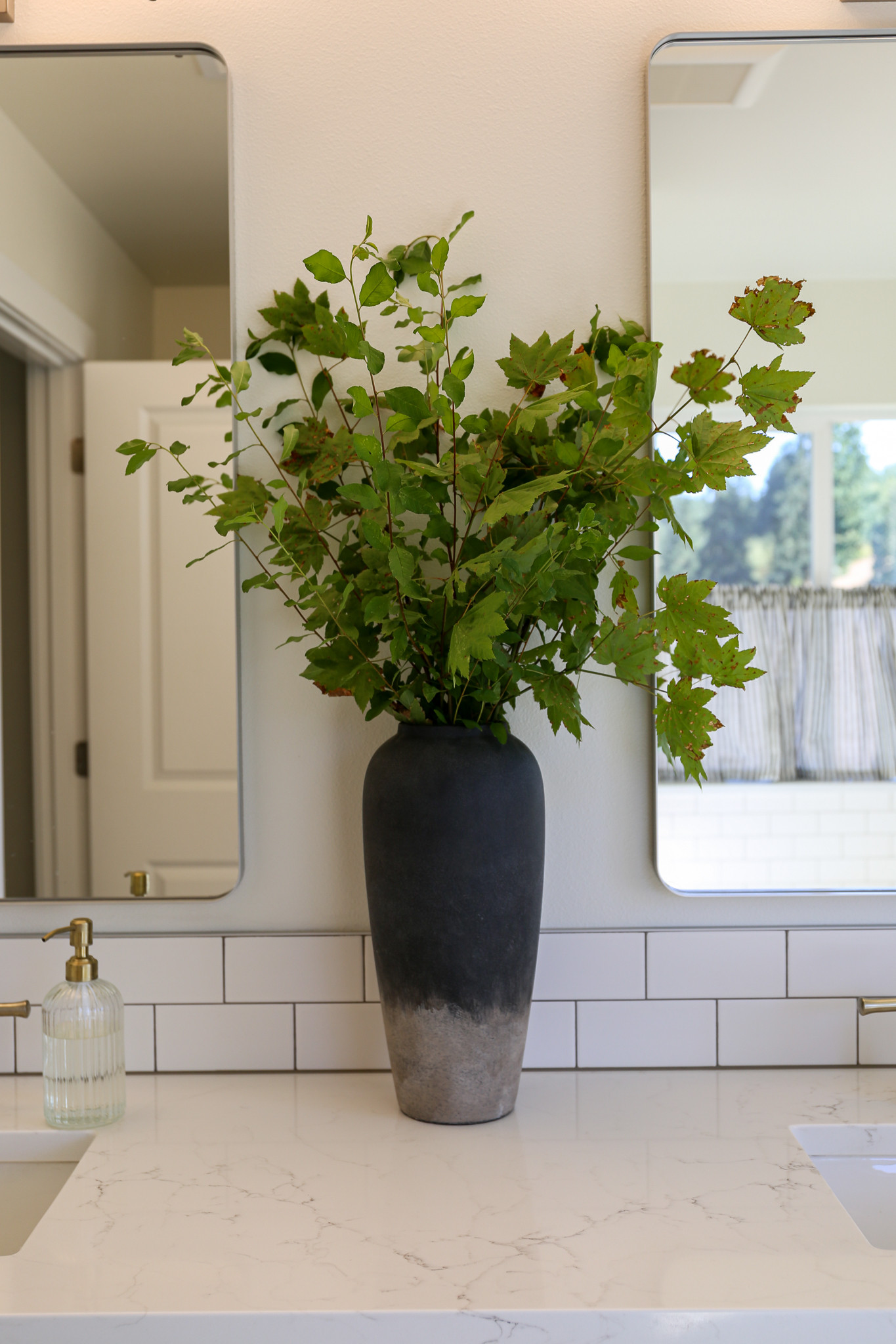  

 I got this large vase for the bathroom and I love it! It’s ceramic with a matte finish. I love the dark to light contrast. 

These are real branches I clipped from around the farm. I have them in a jar of water on a can of condensed milk to get them high enough 😆 inside the vase. 

Now I want the cream color of this vase for the kitchen island  

#LTKFindsUnder50 #LTKHome