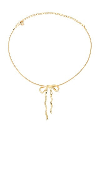 Ettika Bow Organica Pendant Necklace in Metallic Gold. | Revolve Clothing (Global)