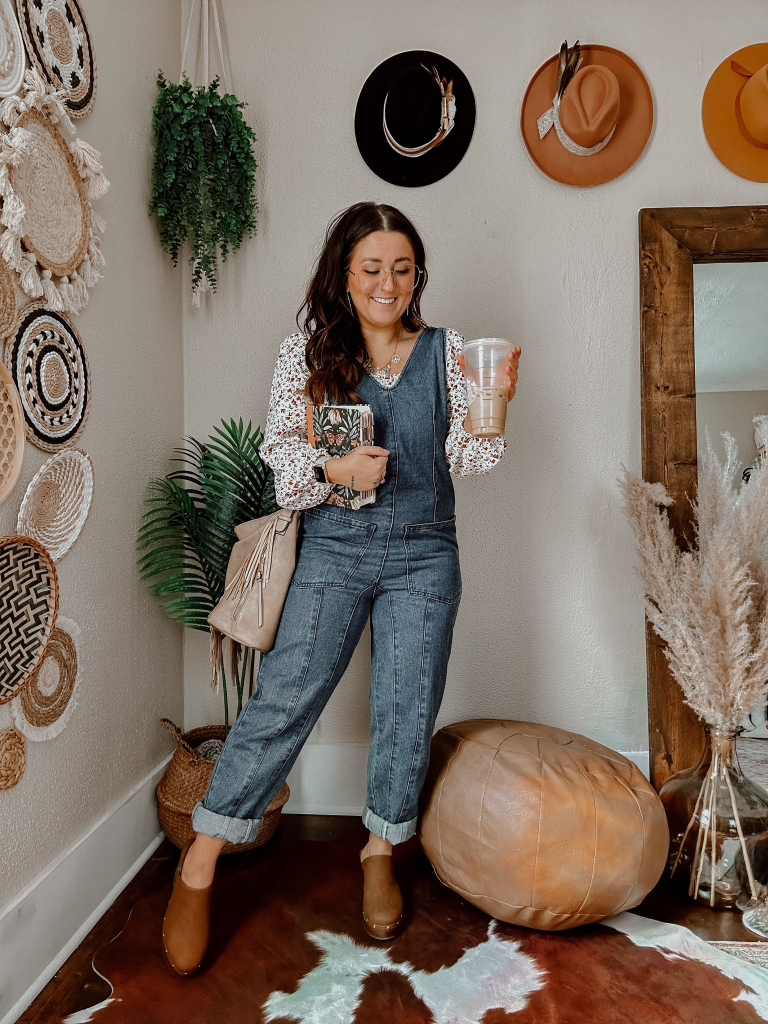 Happy Sunday! Wanted to share my outfit this AM 🫶🏼 these denim overalls are a great swap for less for FP and I LOVE them!! This floral top under was just the cutest little combo — I am READY for all the spring outfits. Denim overalls wearing MEDIUM. Floral smock long sleeve top wearing medium. Brown tan clog heels wearing my TTS. Fringe purse (out of stock but linked others!) and my gold cross earrings! 

#springoutfits #sundayoutfit #churchoutfit #brunchoutfit #girlyoutfits #femininestyle

#LTKSeasonal #LTKU #LTKSpringSale