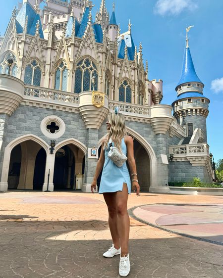Disney World Outfit Inspo 🏰✨ This Cinderella inspired activewear outfit is cute + comfy for a day of exploring Magic Kingdom! 

Disney World outfit,Disneyland outfit, Disney park outfit, Disney bonding, Cinderella outfit, disney princess outfit, sully outfit, Aladdin genie outfit, Cinderella outfit, sleeping beauty outfit, princess jasmine, Elsa outfit, frozen outfit, Snow White outfit, belle outfit, rapunzel outfit, aurora outfit, Ariel outfit, magic kingdom outfit, Epcot outfit, animal kingdom outfit, Hollywood studios outfit, activewear outfit, Disney theme, blue onesie, blue romper, blue tennis dress, blue tennis outfit, blue activewear outfit, light blue outfit, travel outfit, athleisure outfit, blue runsie, free people, blue activewear outfit, blue tank top, blue sports bra, blue skort, blue skirt, blue tennis skirt, blue activewear skirt, white pearl fanny pack, white pearl belt bag, Disney belt bag, Minnie Mouse ears headband, Cinderella ears, Cinderella headband, silver ears, sparkle ears, blue ears, Disney ears, glitter sneakers, white glitter sneakers, Keds, backpack, Disney trip essentials, pink activewear, light blue outfit, athleisure wear, athleisure outfit, white backpack, white sequin backpack, loungefly, Disney wedding, Disney bride, Disney bachelorette, Disney princess theme, pearl denim jacket, bride jean jacket, personalized jean jacket, custom denim jacket, Disney engagement pictures, bridal shoes, bride shoes, bride bag, bridal backpack


#LTKStyleTip #LTKTravel #LTKActive