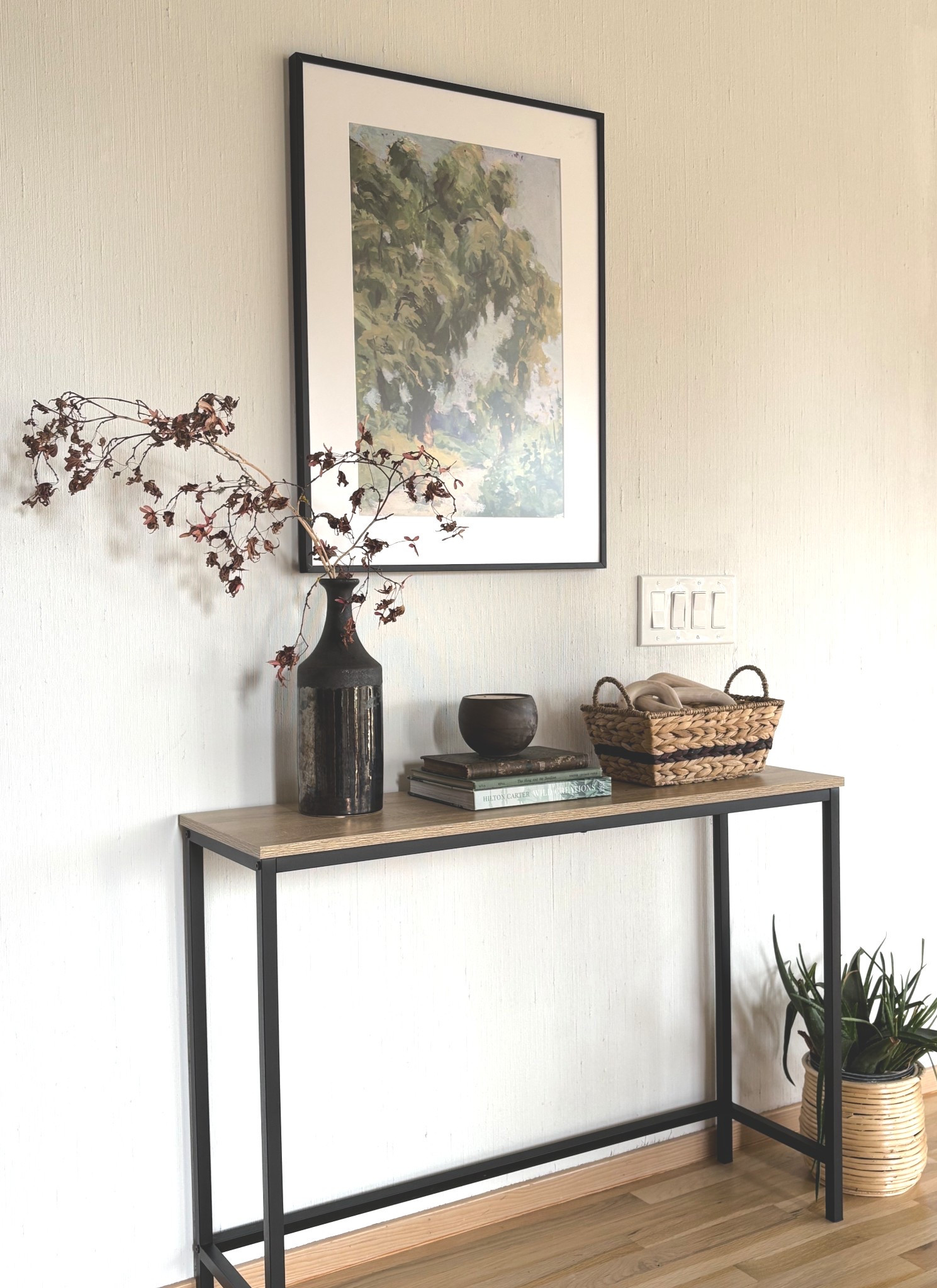 Black Friday sale alert! I love this minimal entryway table - perfect for spaces that need wind furniture styled with a vase, books, and a basket for keys and sunglasses