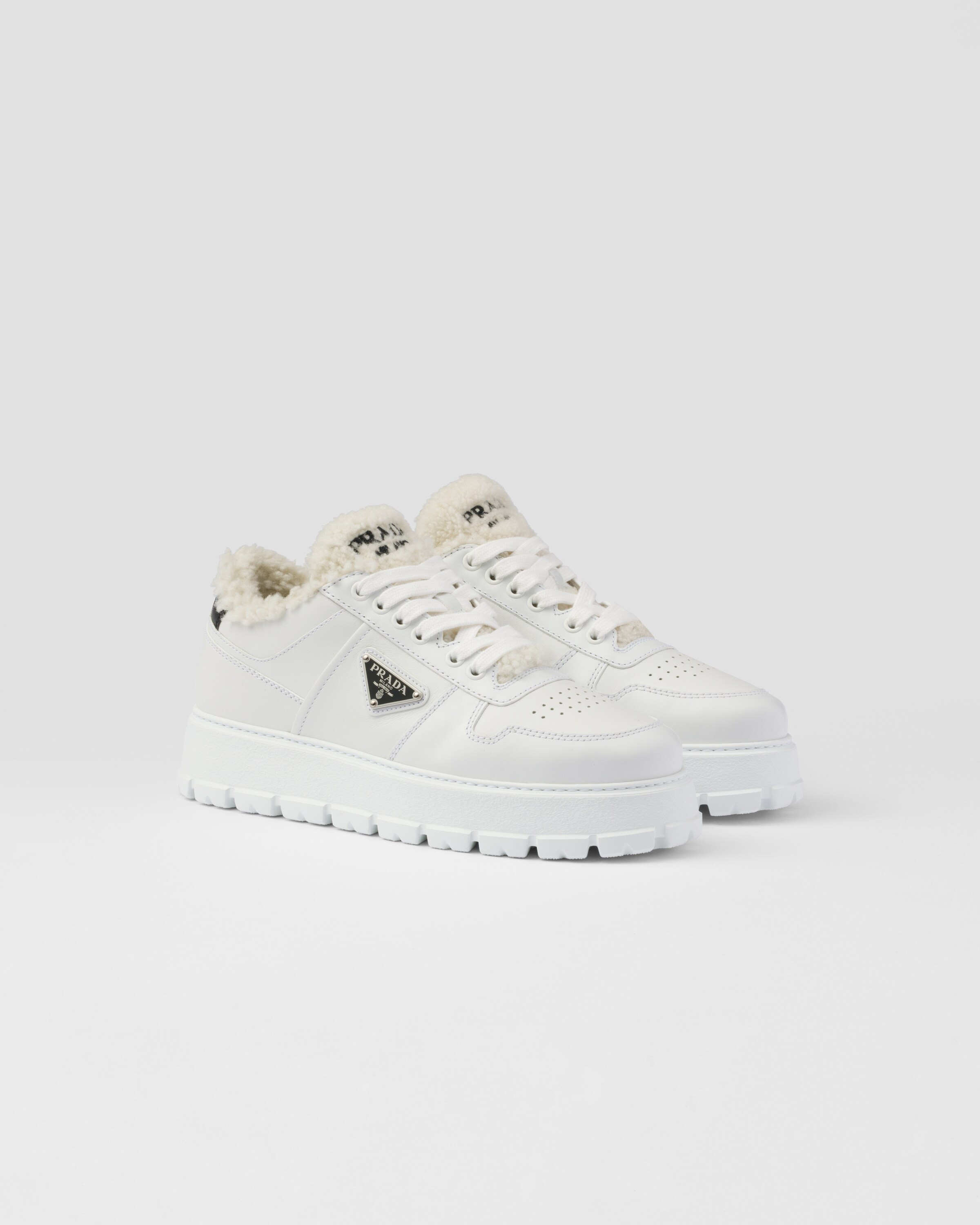 Leather and shearling sneakers | Prada Spa US