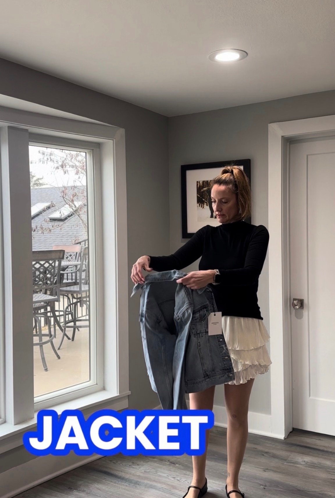 Nothing ties a transitional look together like a perfectly worn-in denim jacket. 🧥✨ This medium-wash layer is my secret for making a feminine ruffled skirt feel a bit more grounded and street-style ready. Check out the link in my bio to shop this exact jacket and my favorite spring basics! #DenimJacket #SpringLayers #TransitionStyle #ShopTheLook @VICI 

My Denim Essentials Style Breakdown
• The Hero Piece: I’m featuring a classic medium-wash denim jacket with a relaxed, slightly oversized fit and traditional button-down detailing.
• The Base: Underneath, I’ve layered a sleek, black long-sleeved mock neck top to create a clean, high-contrast silhouette.
• The Skirt: I’ve paired the structured denim with a playful, tiered white ruffled mini skirt for a touch of feminine movement.
• The Footwear: I finished the look with my reliable black Mary Jane flats, keeping the aesthetic polished and comfortable for all-day wear.
• The Vibe: This ensemble is the definition of "balanced basics"—the rugged denim perfectly offsets the delicate ruffles for a look that feels modern and approachable.

medium wash denim jacket, classic jean jacket, oversized denim layer, tiered ruffled skirt, white mini skirt, black mock neck top, black Mary Janes, transitional spring outfit, casual feminine style, everyday layering, LTKstyle

#LTKOver40 #LTKmomlife #LTKootd