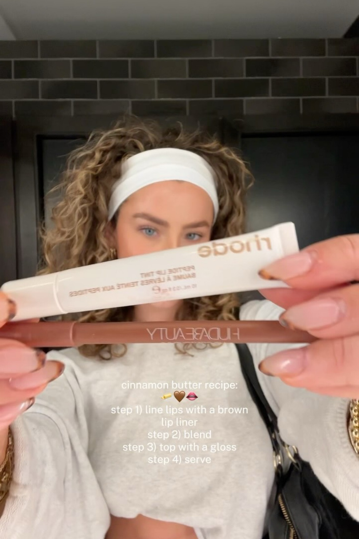 ingredients: new limited edition @rhode lip peptide in “cinnamon roll” and @hudabeauty lip contour 2.0 in “warm brown”