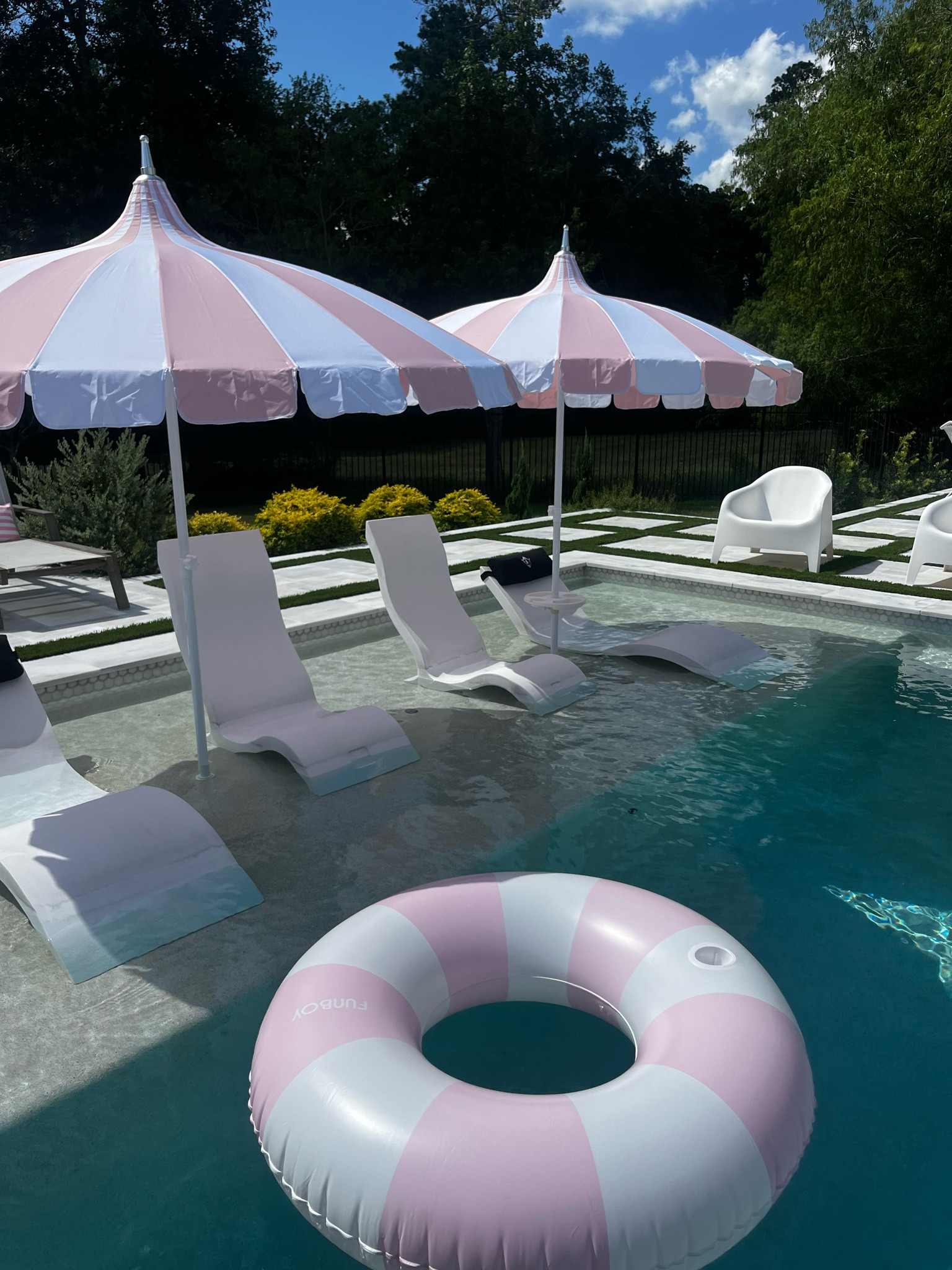 Absolutely love the pop of color these umbrellas add to our mainly black and white pool! 🩷

#LTKHome #LTKSeasonal #LTKSummerSales