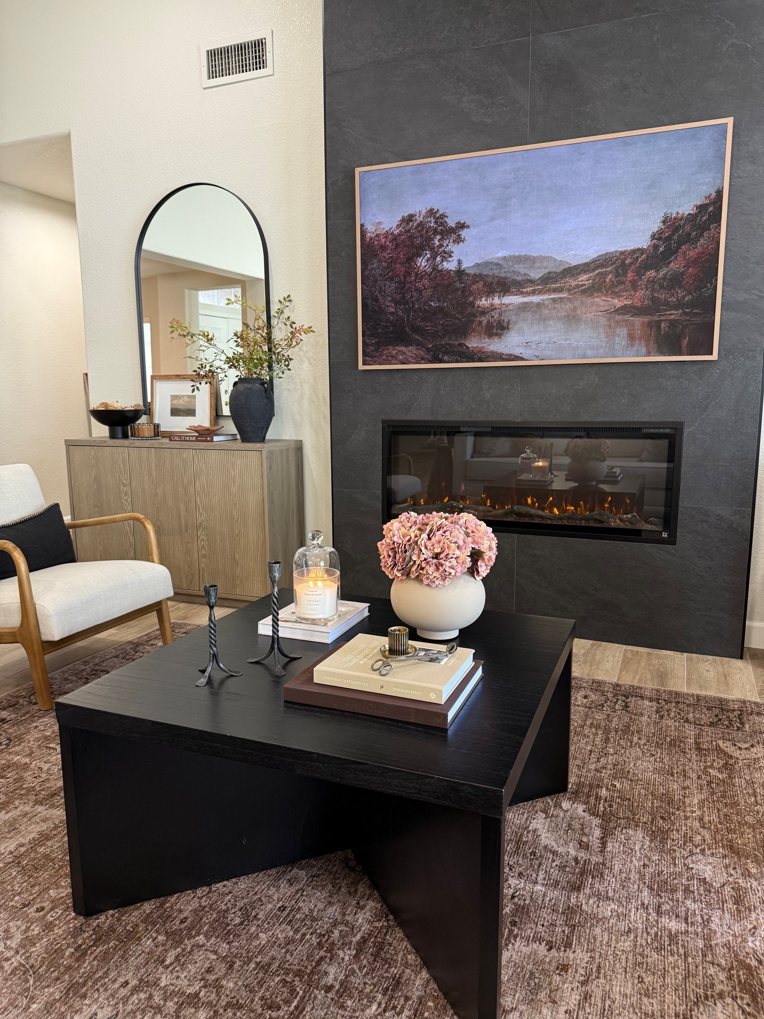 Effortless winter coffee table styling 🤎
I kept this look simple with layered books, a neutral vase of faux stems, and warm candlelight for a cozy, lived-in feel.
•••
Winter coffee table decor, neutral coffee table styling, coffee table decor ideas, autumn living room, winter home inspiration, organic modern decor, cozy living room ideas, faux florals, hydrangea stems, winter decorating tips, coffee table accessories, winter home accents, minimalist winter decor, seasonal home styling


#LTKHoliday #LTKHome #LTKSeasonal