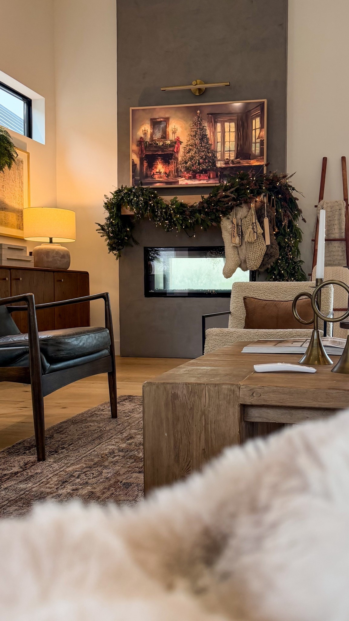 Coziest corner of the house right now. We’re running the Samsung Frame TV with a Christmas art download from Etsy — it’s a huge pack of 60+ artwork pieces, so I can swap out the vibe all season long. The Frame TV is on sale right now from Samsung, which is the best time to grab one if you’ve been thinking about it.

I kept the rest of the look simple and warm: faux garland with twinkle lights, brass accents, knit stockings, our boucle accent chair, the wood coffee table, and the black leather chair. Linking everything I can below, including the exact artwork pack and our Frame TV.

Samsung Frame TV art, downloadable art, Etsy art pack, Christmas TV art, holiday living room decor, neutral Christmas decor, faux garland, boucle chair, modern living room, cozy Christmas styling.



#LTKFindsUnder50 #LTKHome #LTKHoliday