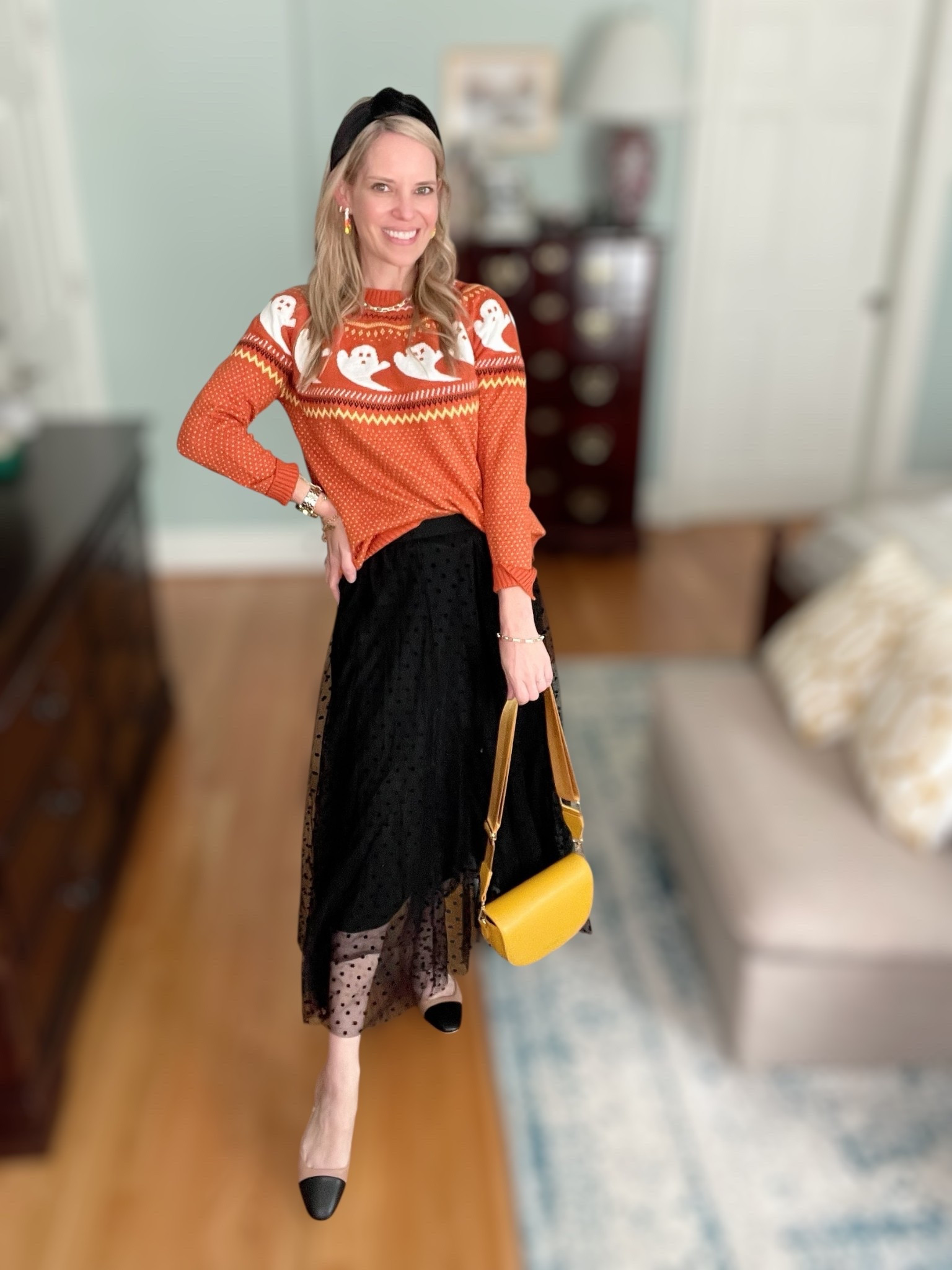 👻 Spooky season style made chic! I paired this adorable orange ghost sweater with a flowy black polka dot tulle skirt for a fun and feminine Halloween outfit. To finish the look, I added a bold yellow crossbody, a velvet knotted headband, candy corn earrings, and classic cap-toe heels. 🎃🖤

This outfit is perfect for everything from classroom parties to pumpkin patch photos, trick-or-treating with the kids, or even a casual Halloween get-together. It’s festive without being a costume—giving you that playful yet polished fall vibe. 🍂✨

Halloween outfit inspo, spooky season fashion, cute ghost sweater Amazon, polka dot tulle skirt, festive fall outfit, Halloween party look, October outfit ideas, candy corn earrings, cozy chic Halloween sweater, Amazon fall fashion


#LTKShoeCrush #LTKFindsUnder50 #LTKItBag