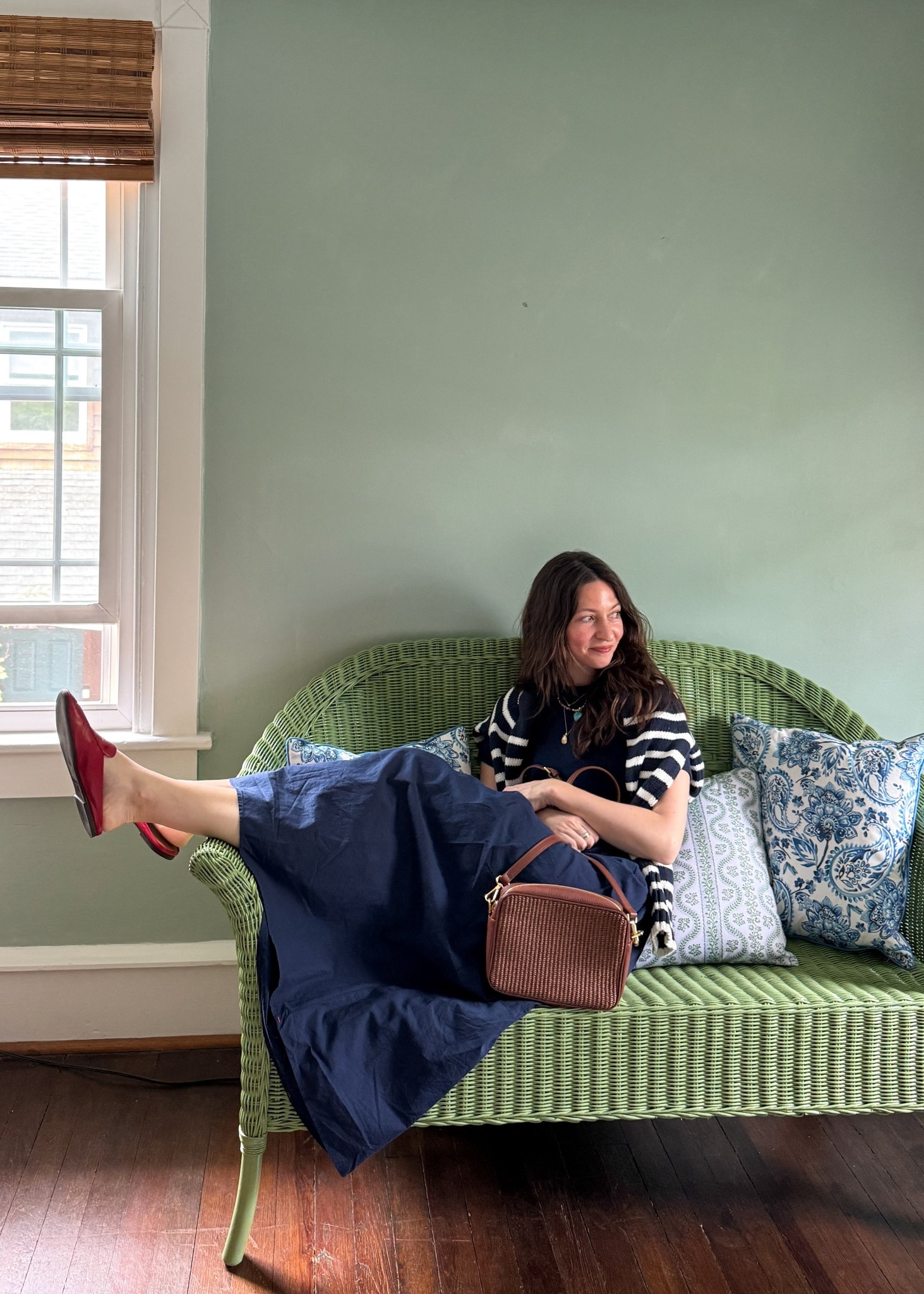 It is a truth universally acknowledged that every girl is in  want of a good throw on & go dress. Let’s style this one from @xirena together 🩷 Because it’s a solid navy, I added a colorful beaded necklace & red leather mules for personality, a cotton striped sweater for texture, & a raffia & leather bag for interest & to ground the look. Then my 5 minute no makeup-makeup routine is a little miracle balm on my cheeks, mascara, my favorite lip liner by @jonesroadbeauty, & some hair oil for my air dried waves! 

#LTKootd #LTKBeauty #LTKgrwm