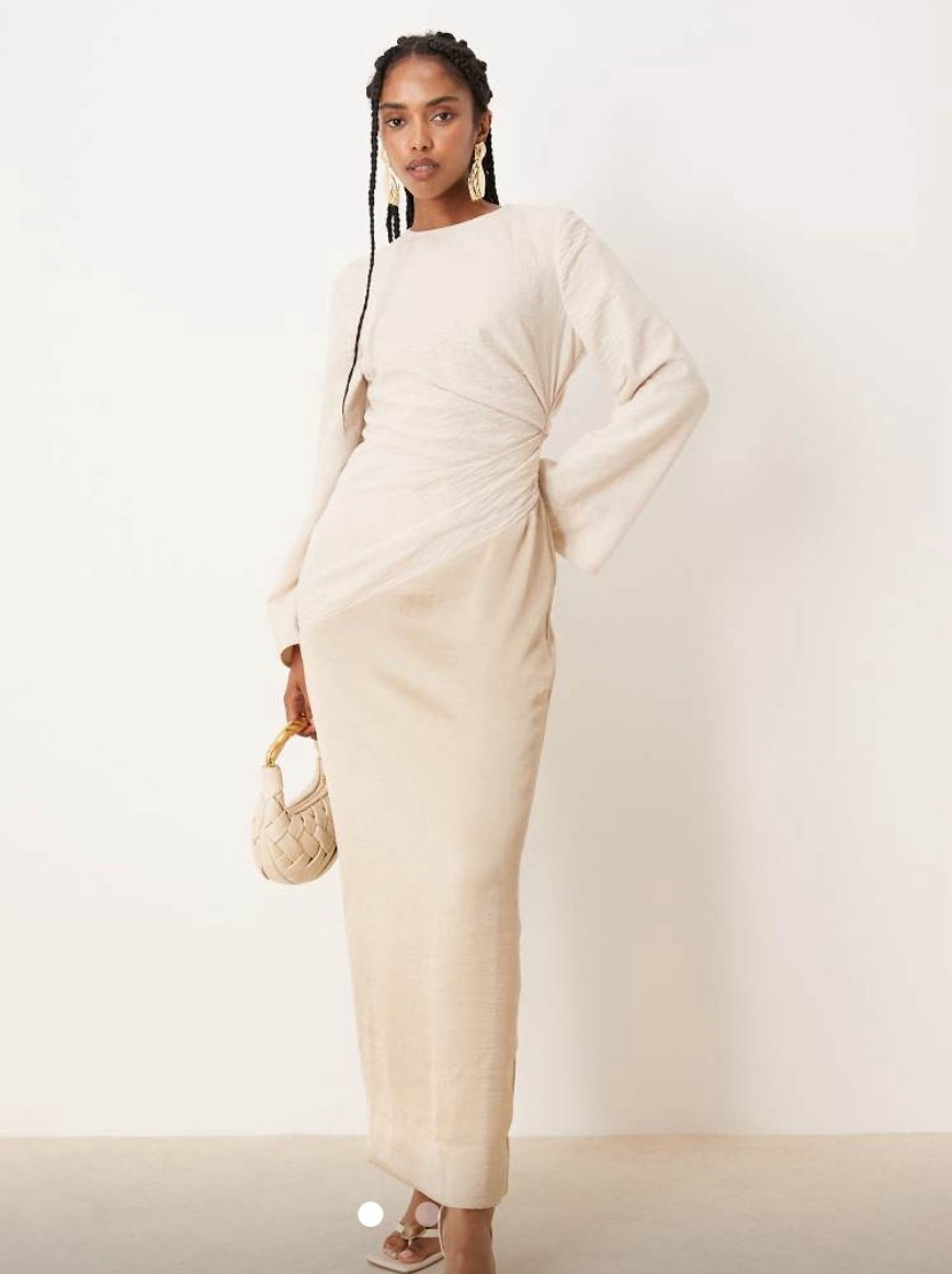 Elevate your neutral wardrobe with this refined stone-hued ruched maxi dress from ASOS DESIGN 🤎✨ Designed with soft crinkle-textured fabric, romantic flared sleeves, a round neckline, and a subtle keyhole back, this dress blends simplicity with quiet luxury. Finished with a flattering kick slit for movement and shape, it’s perfect for weddings, garden parties, or minimalist evening looks.

#LTKTravel #LTKParties