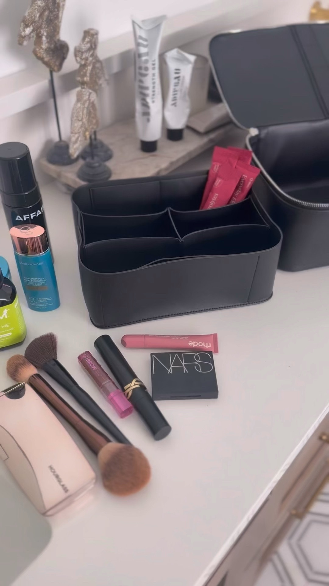 minimal travel essentials // no make up make up // electrolytes // tinted sunscreen // real leather travel accessories 

#LTKTravel #LTKOver40 #LTKselfcare