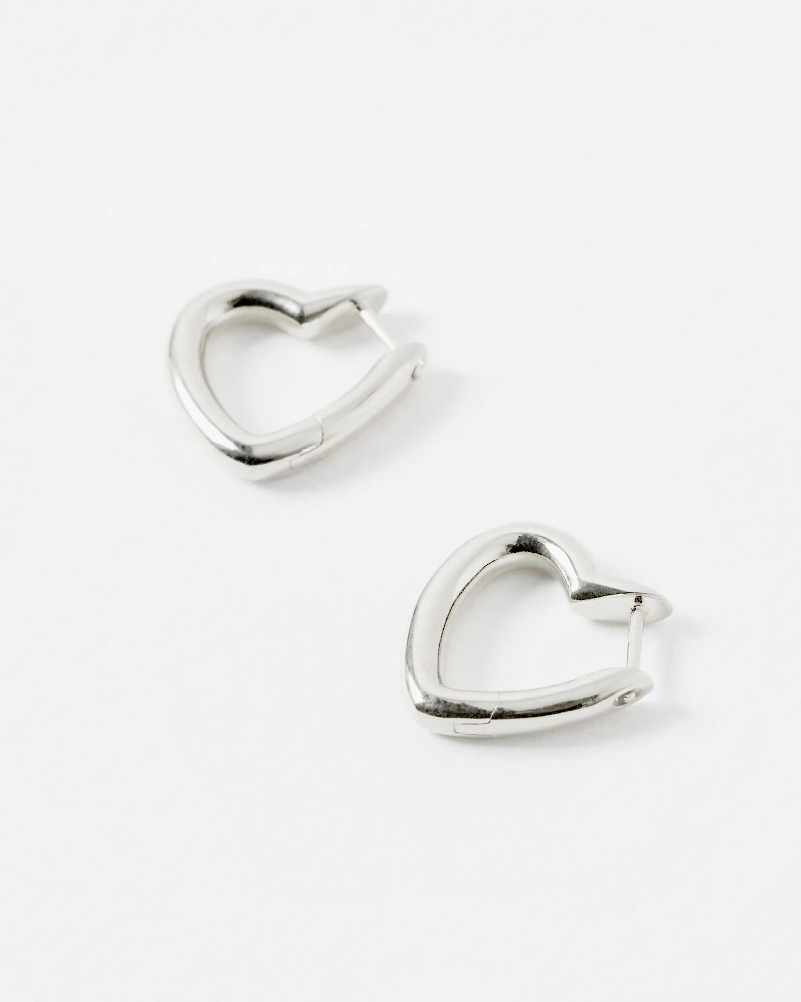 Polly Puffy Heart Small Silver Plated Hoop Earrings | Oliver Bonas | Oliver Bonas (Global)
