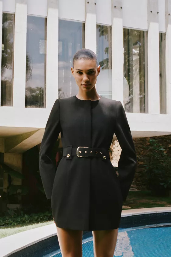 Round neck, long sleeve blazer with shoulder pads. Matching belt with belt loops and gold-tone bu... | Zara US