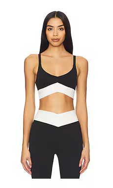 LSPACE Unmatched Sports Bra in Black & Cream from Revolve.com | Revolve Clothing (Global)