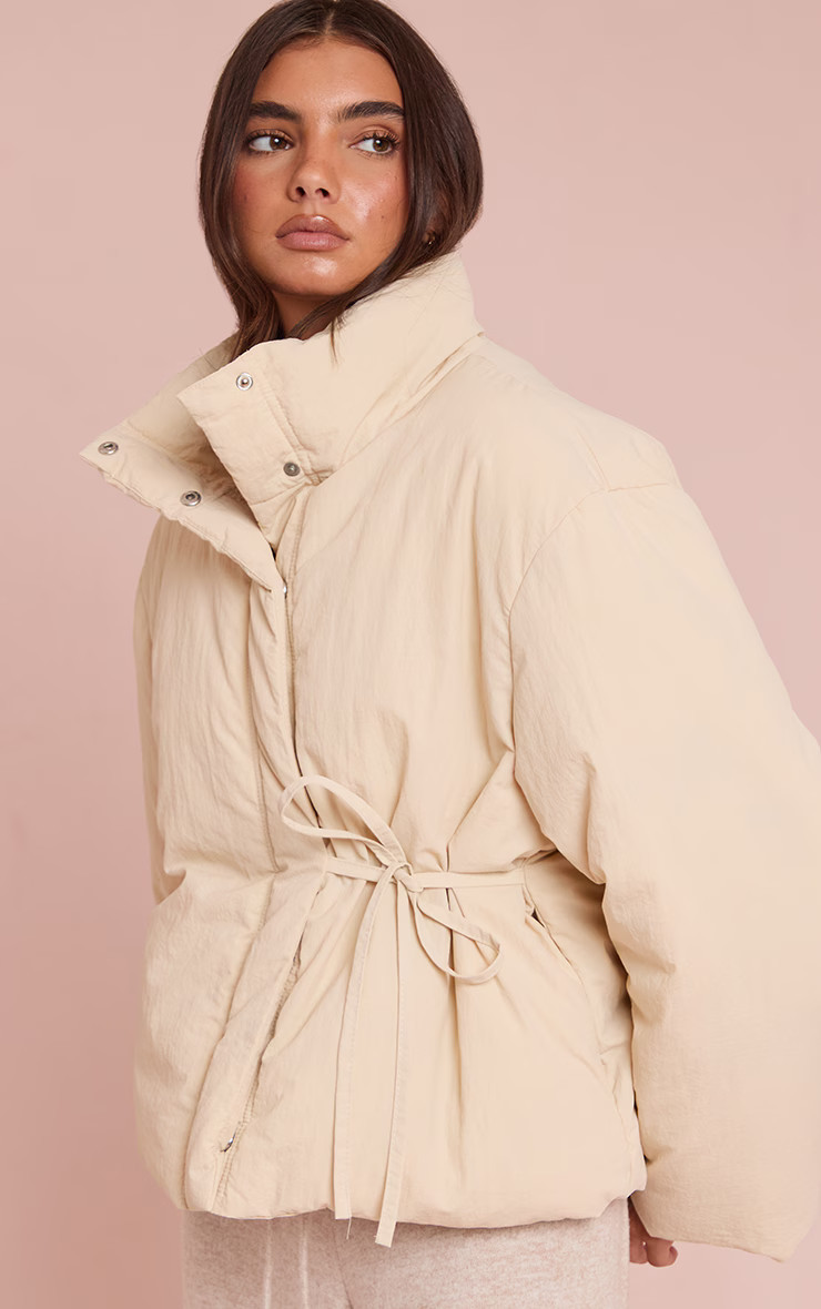 Cream High Neck Tie Waist Quilted Puffer Jacket | Pretty Little Thing (Australia & New Zealand)