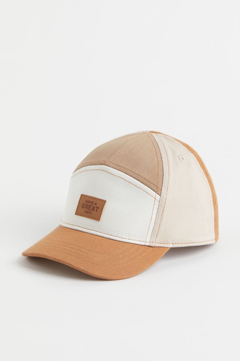 Cap in woven cotton fabric with an internal sweatband in woven cotton fabric. Opening at back wit... | H&M (US + CA)