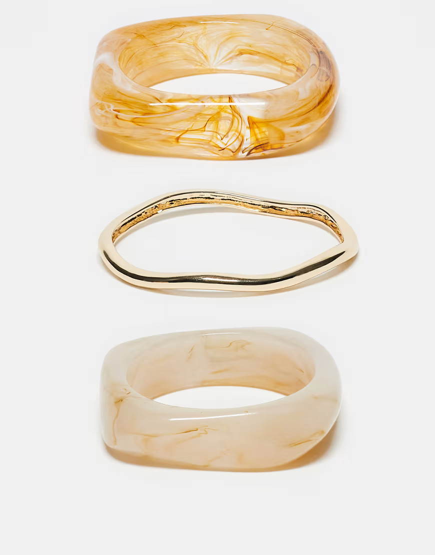 ASOS DESIGN pack of 3 bangles in mixed resin and gold tone | ASOS (Global)