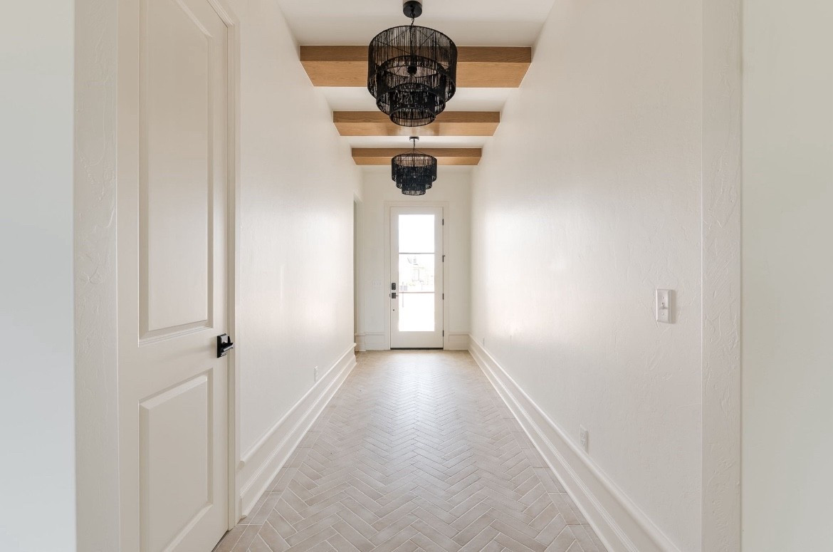 One of my favorite bold-yet-elegant lighting moments. These tiered black pendants instantly elevate this neutral hallway with contrast and texture. Linked the exact fixtures here—perfect for entryways, hallways, or even over an island. #LTKhome #LTKlighting #organicmodern

#LTKHome