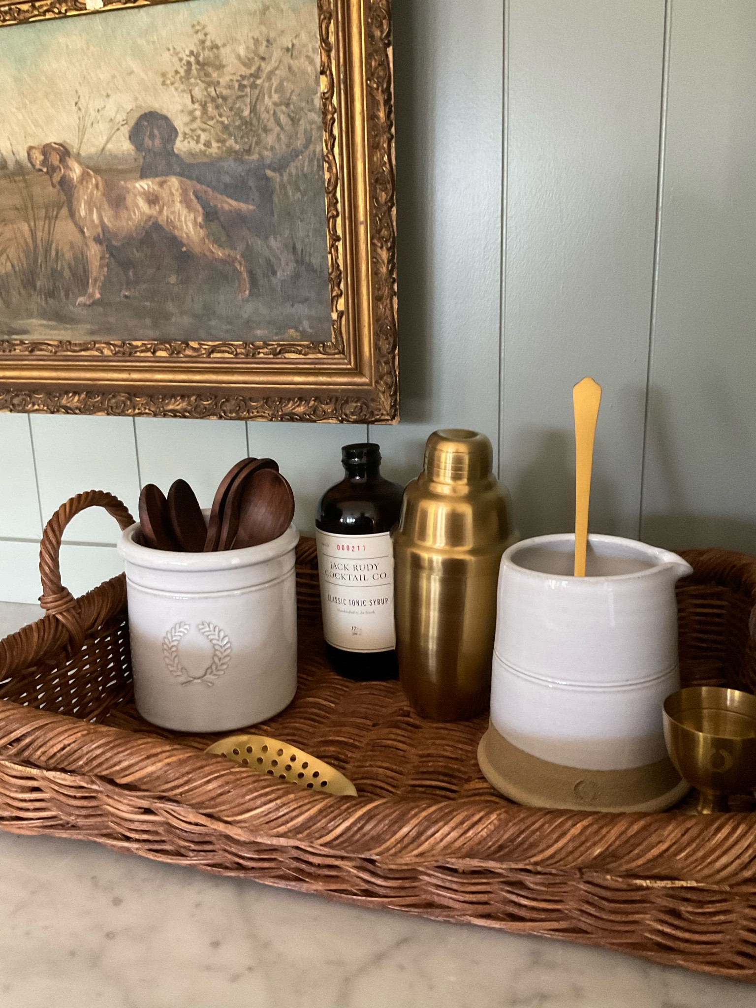 Barware with a country flair. Farmhouse Pottery, cocktail shaker, beaker, crock, spoons, farmhouse, antique, vintage, studio McGee, target find, wicker basket, brass 

#barware #englishkitchen #farmhouse 

#LTKSeasonal #LTKHoliday #LTKhome